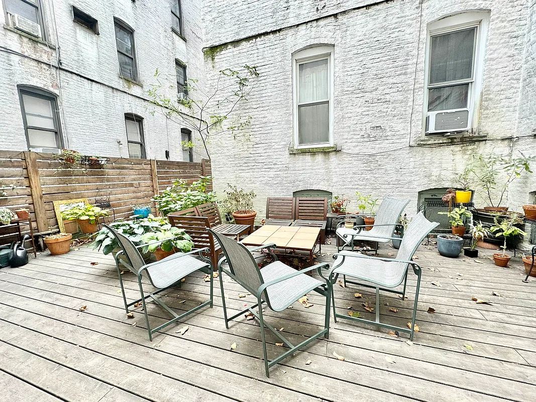 2022 Beverley Road, Unit 3 Brooklyn, NY 11226 - Photo 6 of 11 a view of a chairs and table on the deck