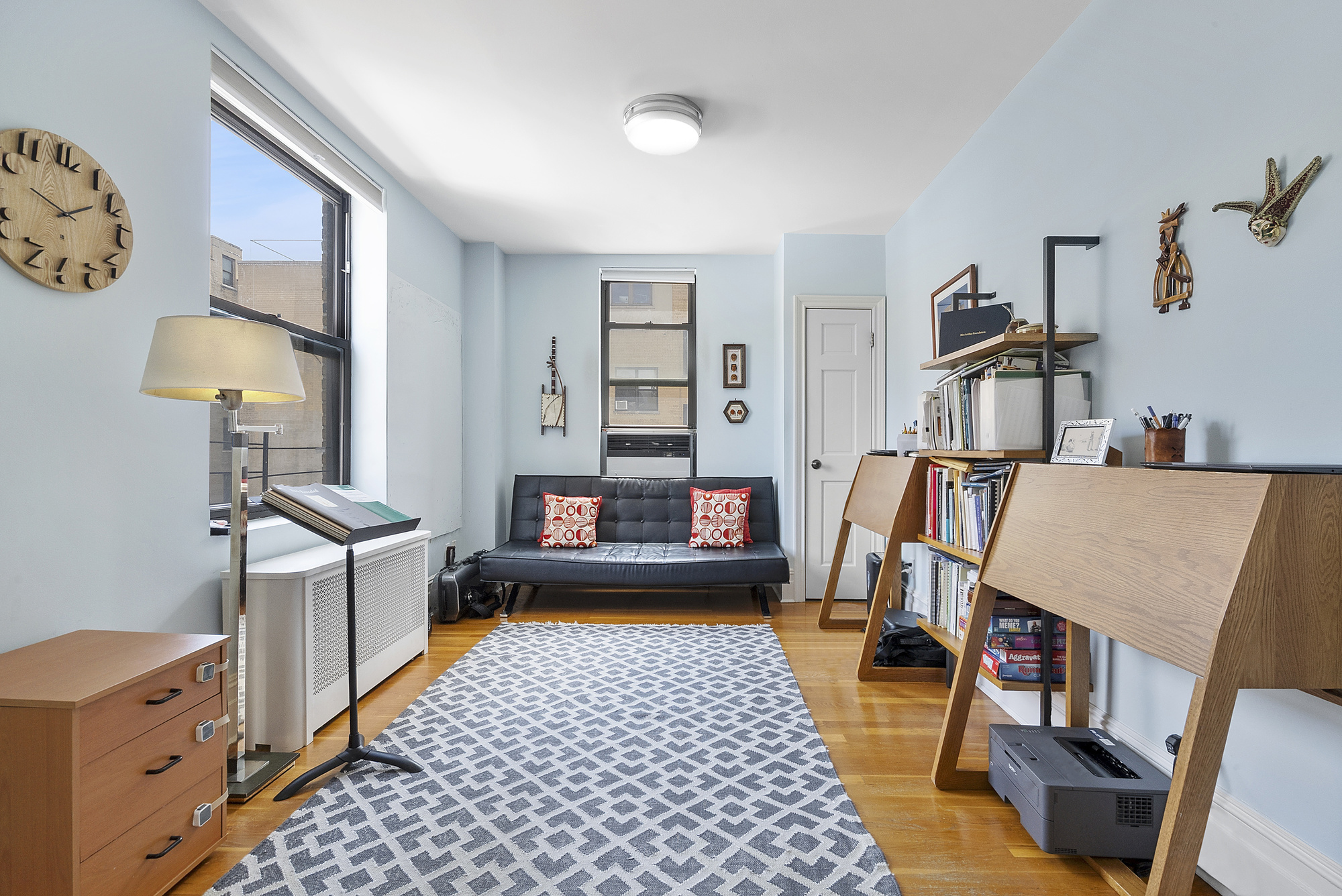 514 West End Avenue, Unit 14A Manhattan, NY 10024 - Photo 8 of 9 a bed room with a bed and a dresser