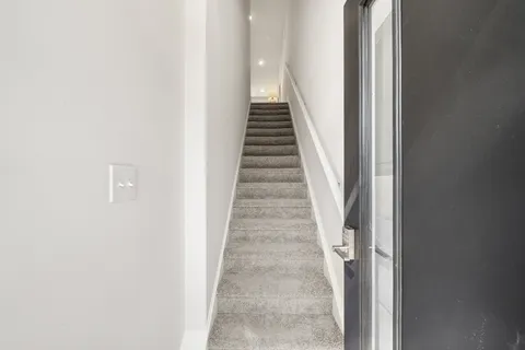 a bathroom with a toilet sink and bathtub