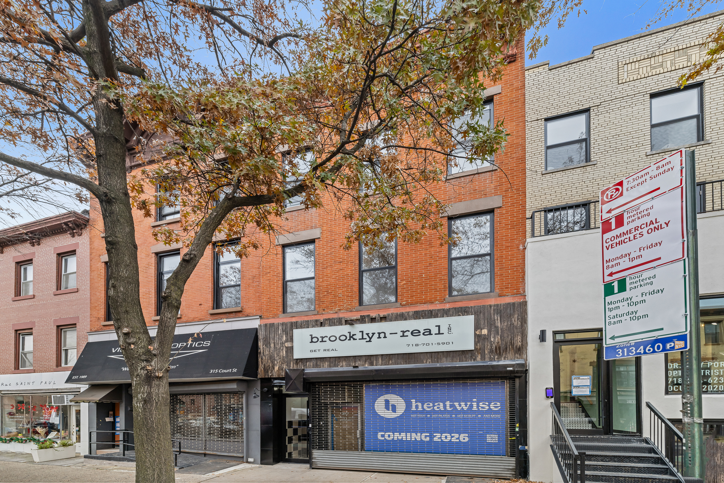 317 Court Street, Unit 2 Brooklyn, NY 11231 - Photo 13 of 14 a sign on a pole on a street