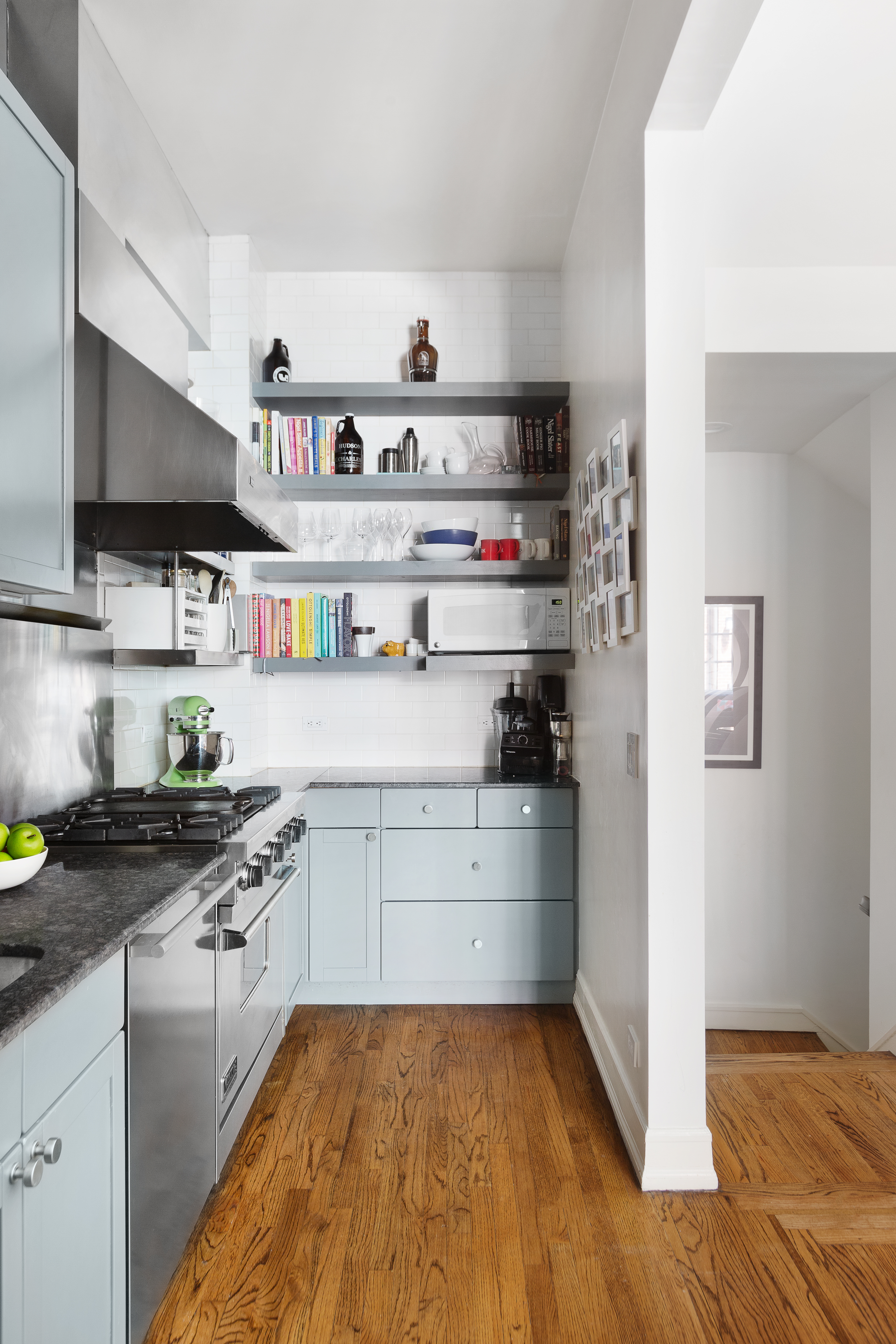 687 Greenwich Street, Unit TH7 Manhattan, NY 10014 - Photo 6 of 23 a kitchen with stainless steel appliances granite countertop a refrigerator and a sink