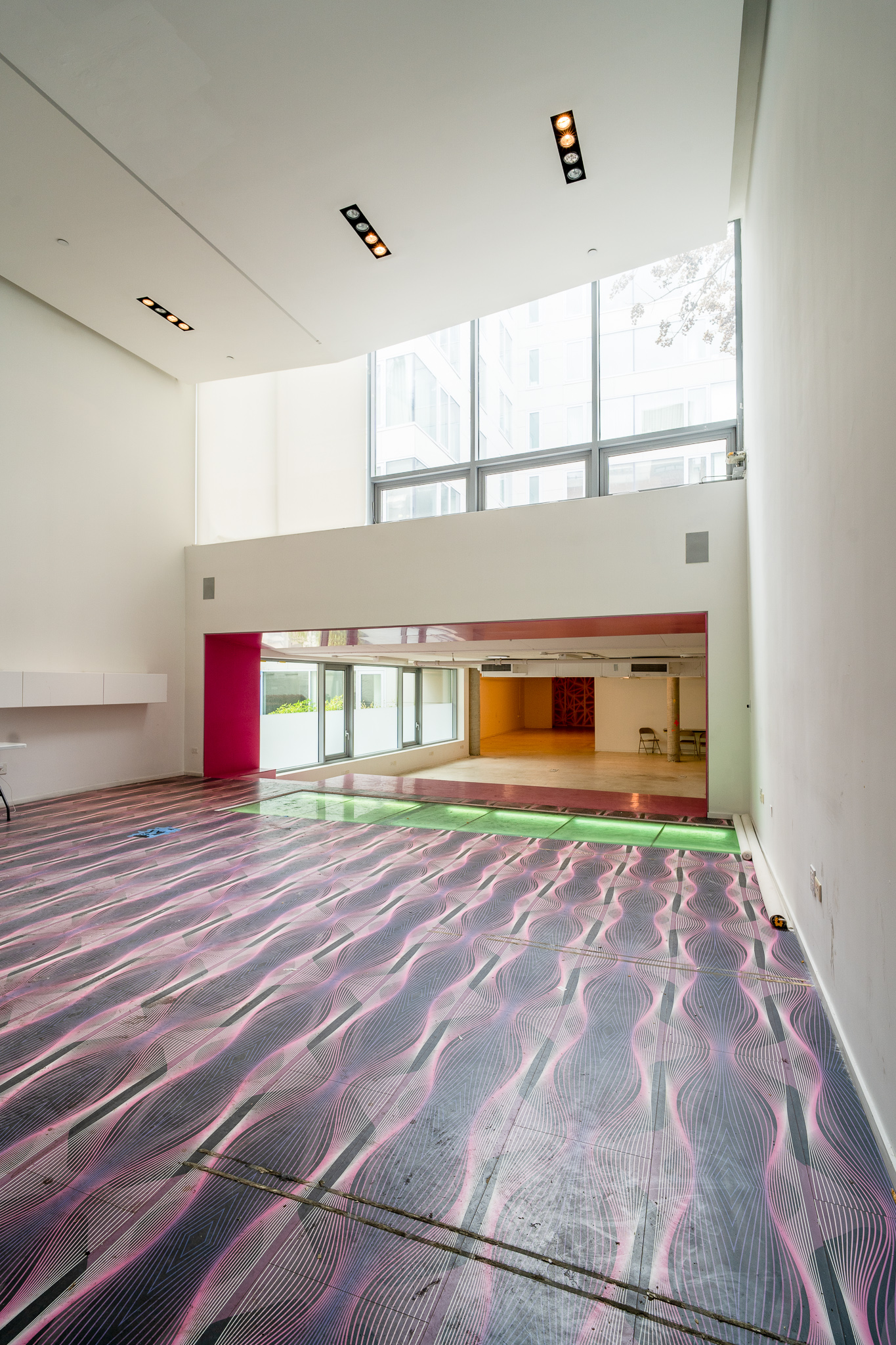 a room with a bed and window