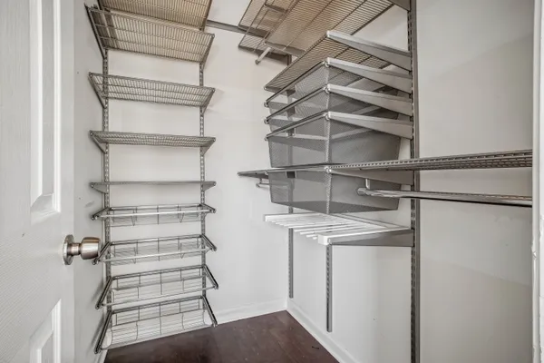 a view of a room with racks on the wall