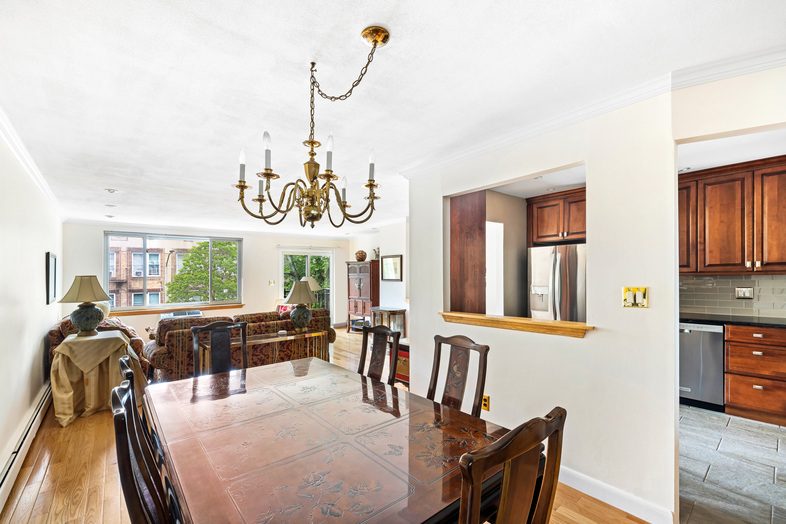 436 78th Street, Unit 5 Brooklyn, NY 11209 - Photo 5 of 10 a view of a dining room with furniture window and outside view