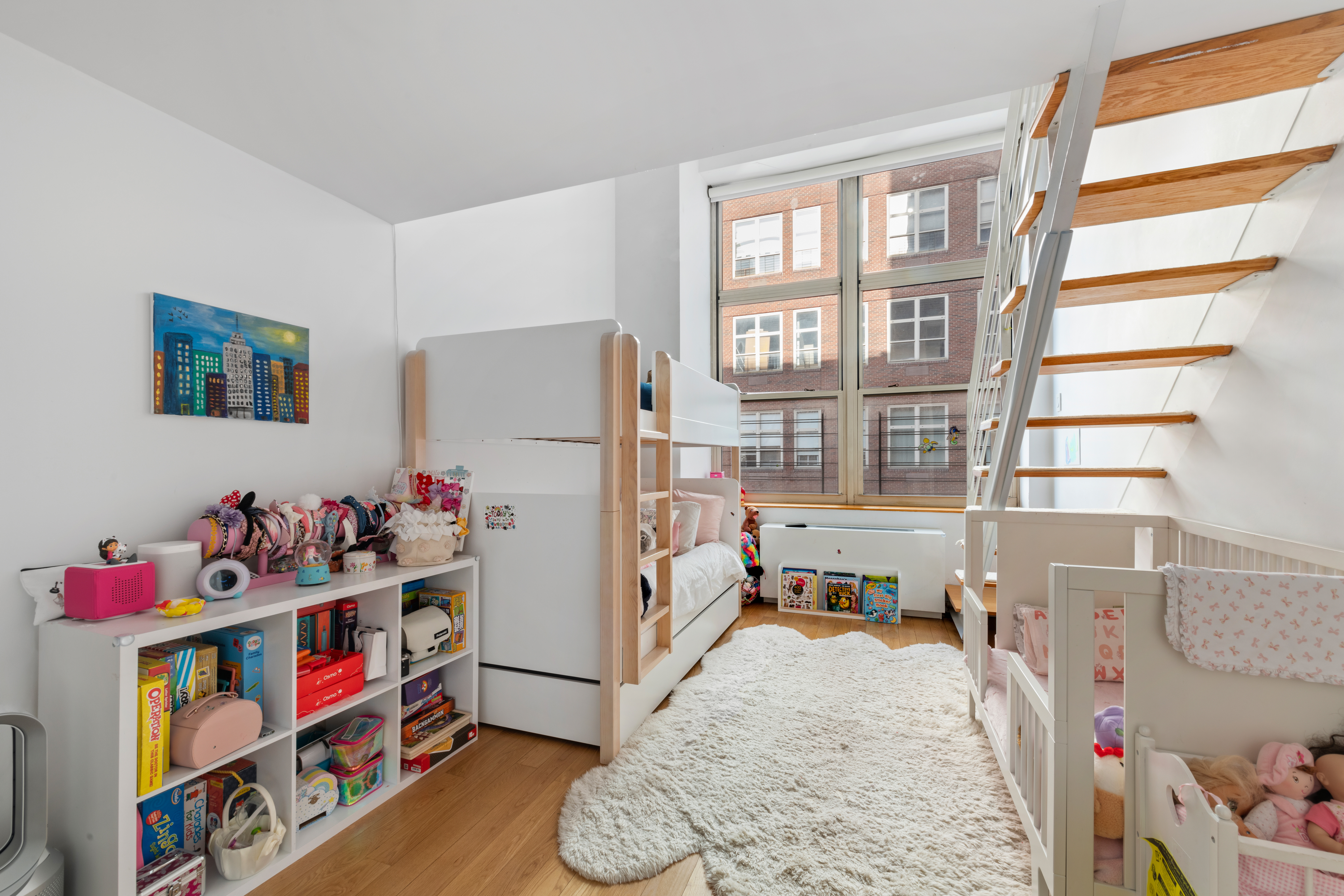 120 East 87th Street, Unit R16G Manhattan, NY 10128 - Photo 12 of 20 a room with toys and white walls