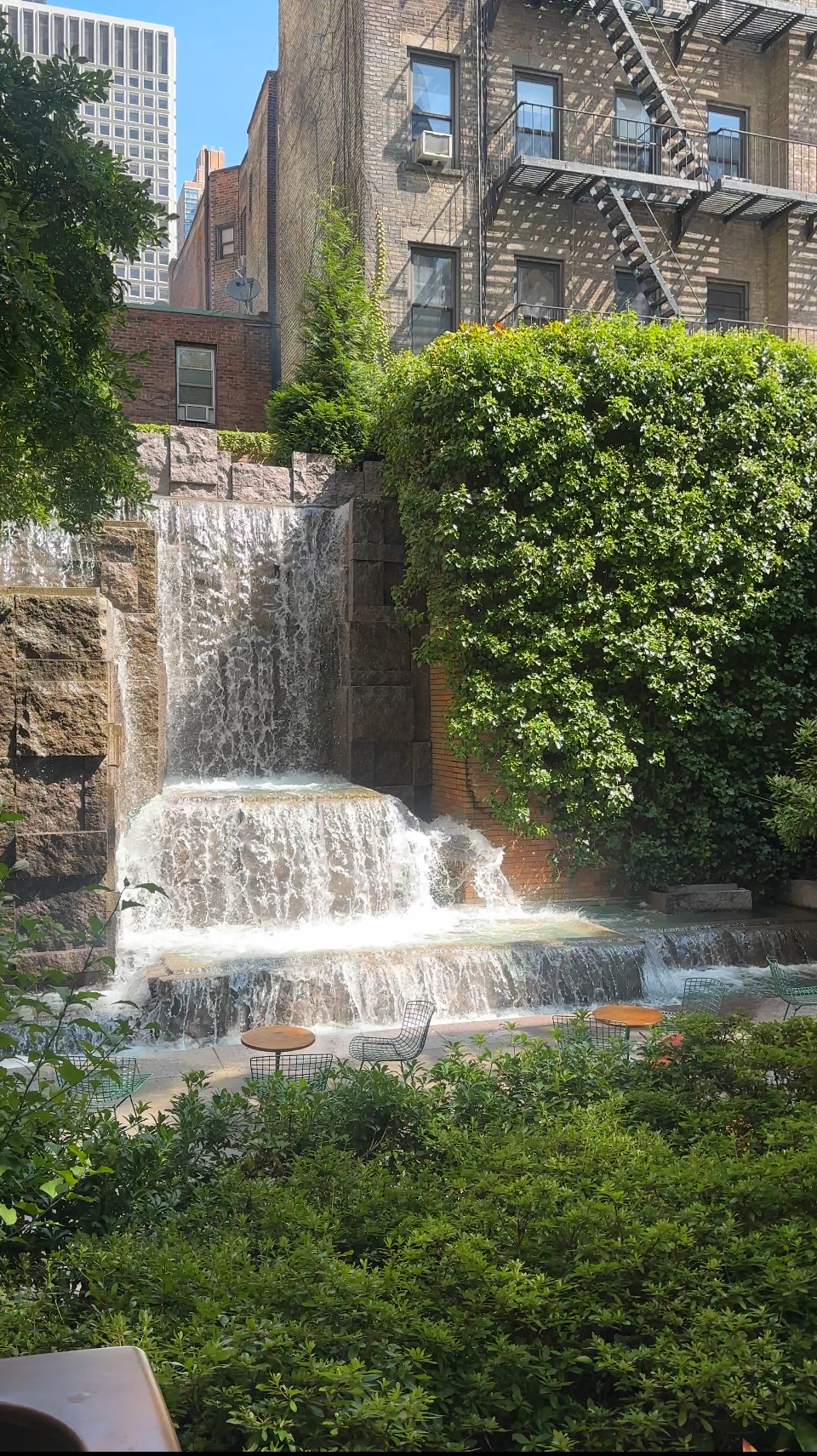 246 East 51st Street, Unit 22 Manhattan, NY 10022 - Photo 7 of 9 a view of yard with green space