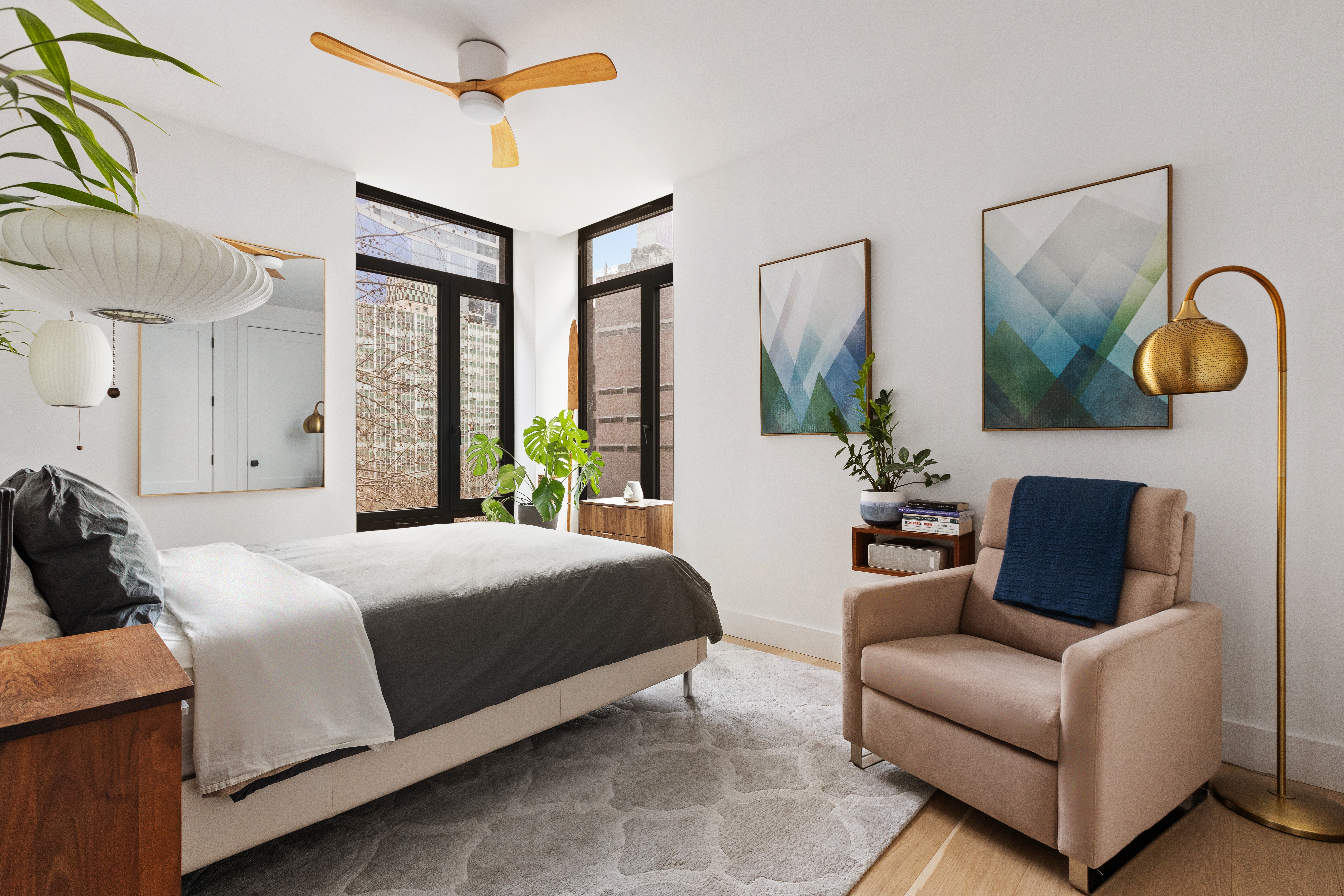 112 Fleet Place, Unit 6A Brooklyn, NY 11201 - Photo 7 of 11 a bedroom with a bed couch and painting on the wall