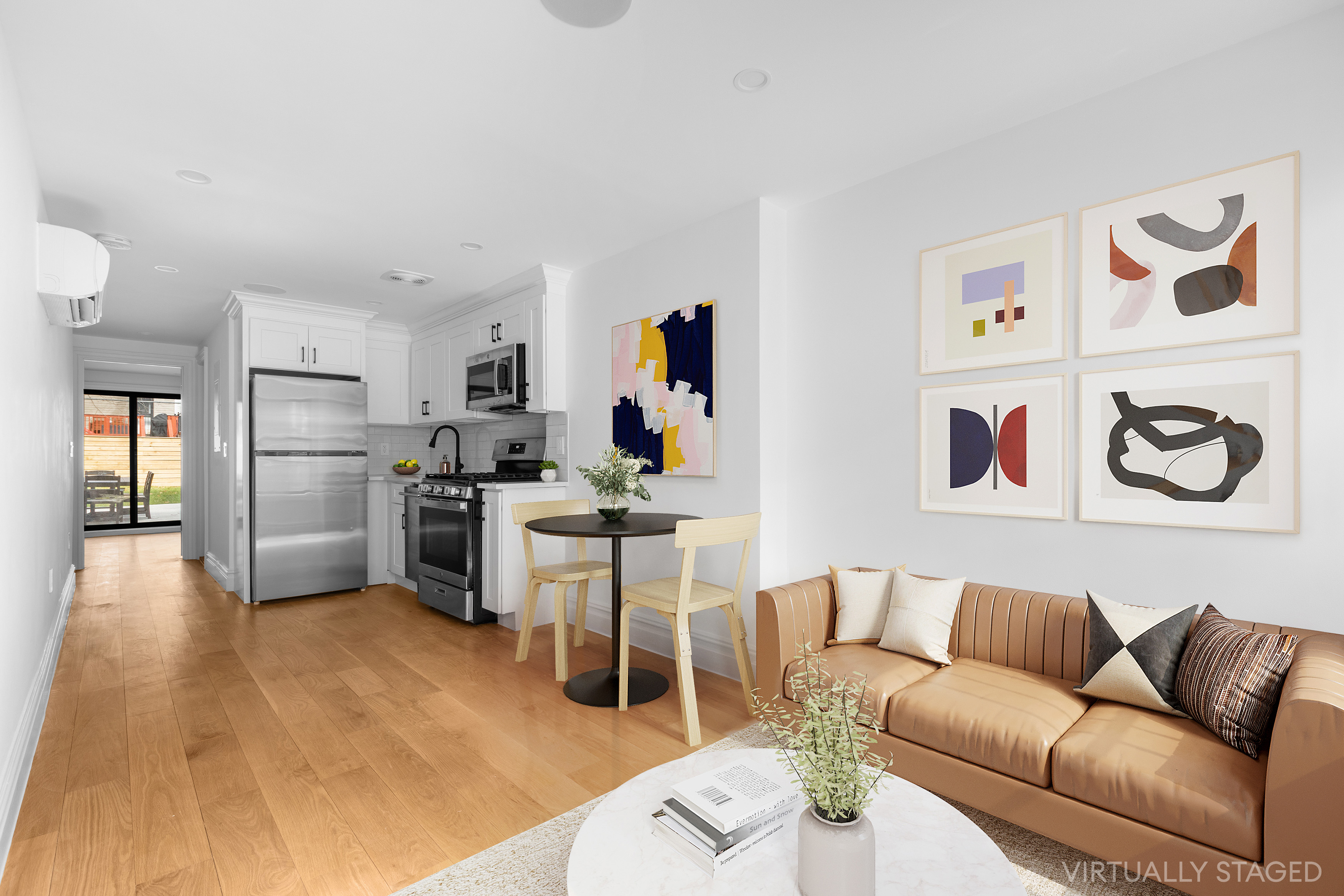 527 Quincy Street, Unit 1 Brooklyn, NY 11221 - Photo 2 of 8 a living room with furniture and kitchen view