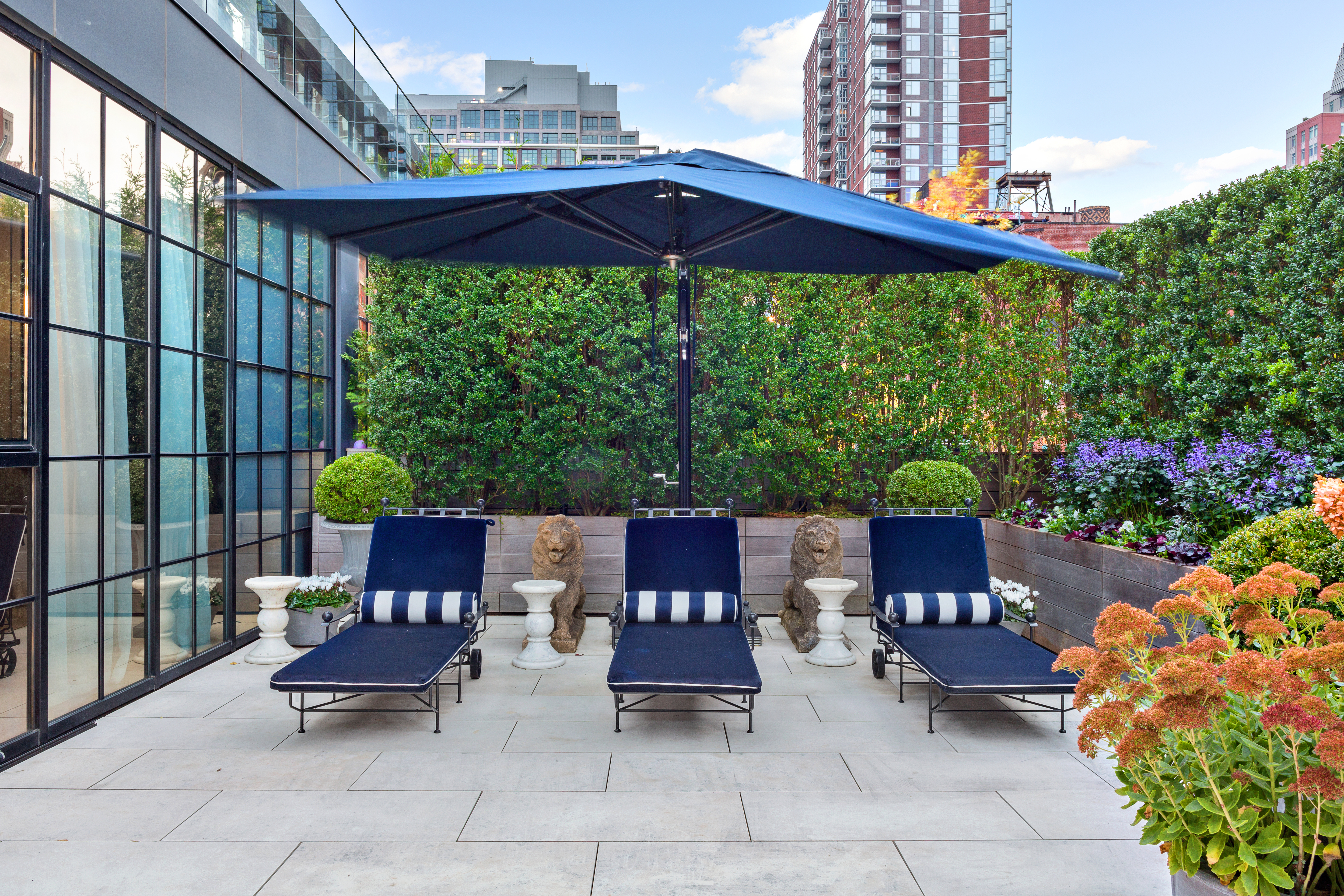 51 Jay Street, Unit PHB Brooklyn, NY 11201 - Photo 8 of 21 a view of backyard with outdoor seating and plants