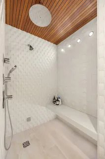 a kitchen with a stove a sink and a refrigerator