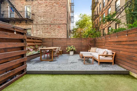 a view of a swimming pool with a lounge chairs
