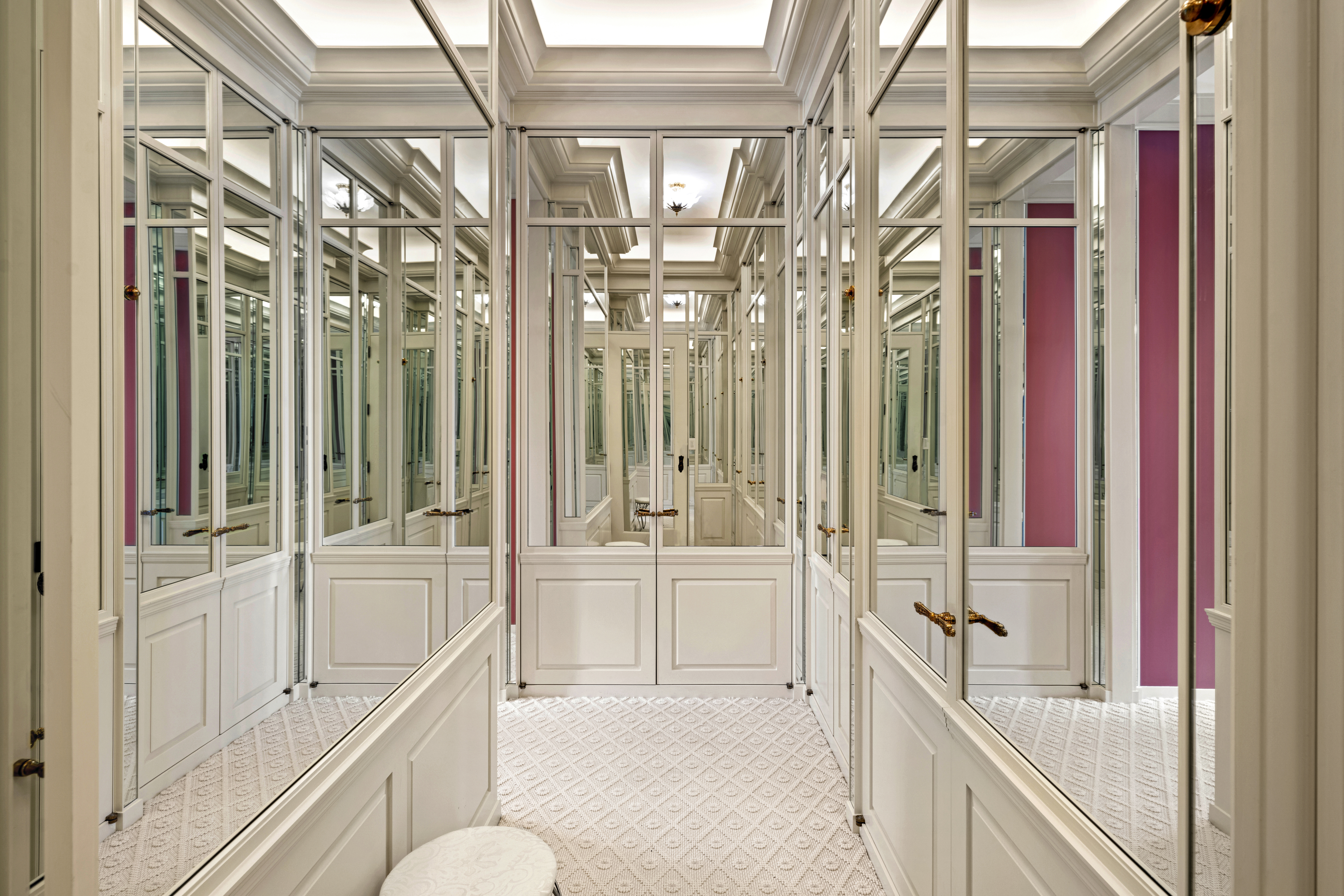1 Central Park South, Unit 1013 Manhattan, NY 10019 - Photo 11 of 32 a bathroom with a tub a sink and a large mirror