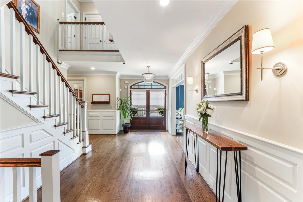 248 Valley Ridge Road Haverford, PA 19041 - Photo 4 of 44 a view of a hallway with wooden floor and staircase