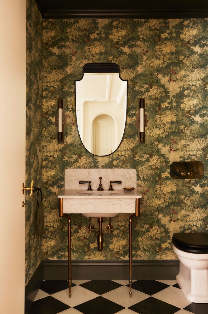 a bathroom with a toilet and a sink