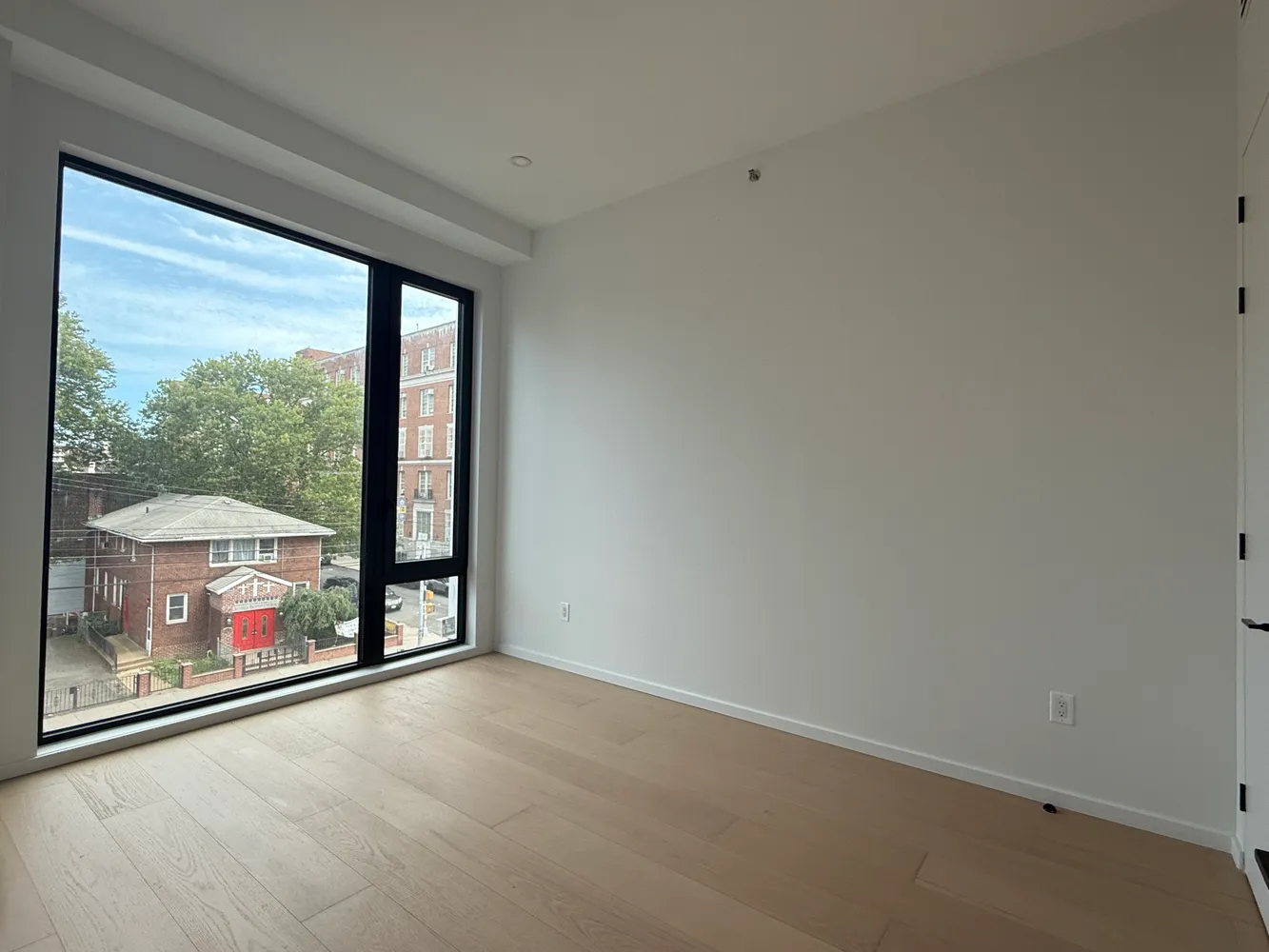 a view of a room with sliding glass door