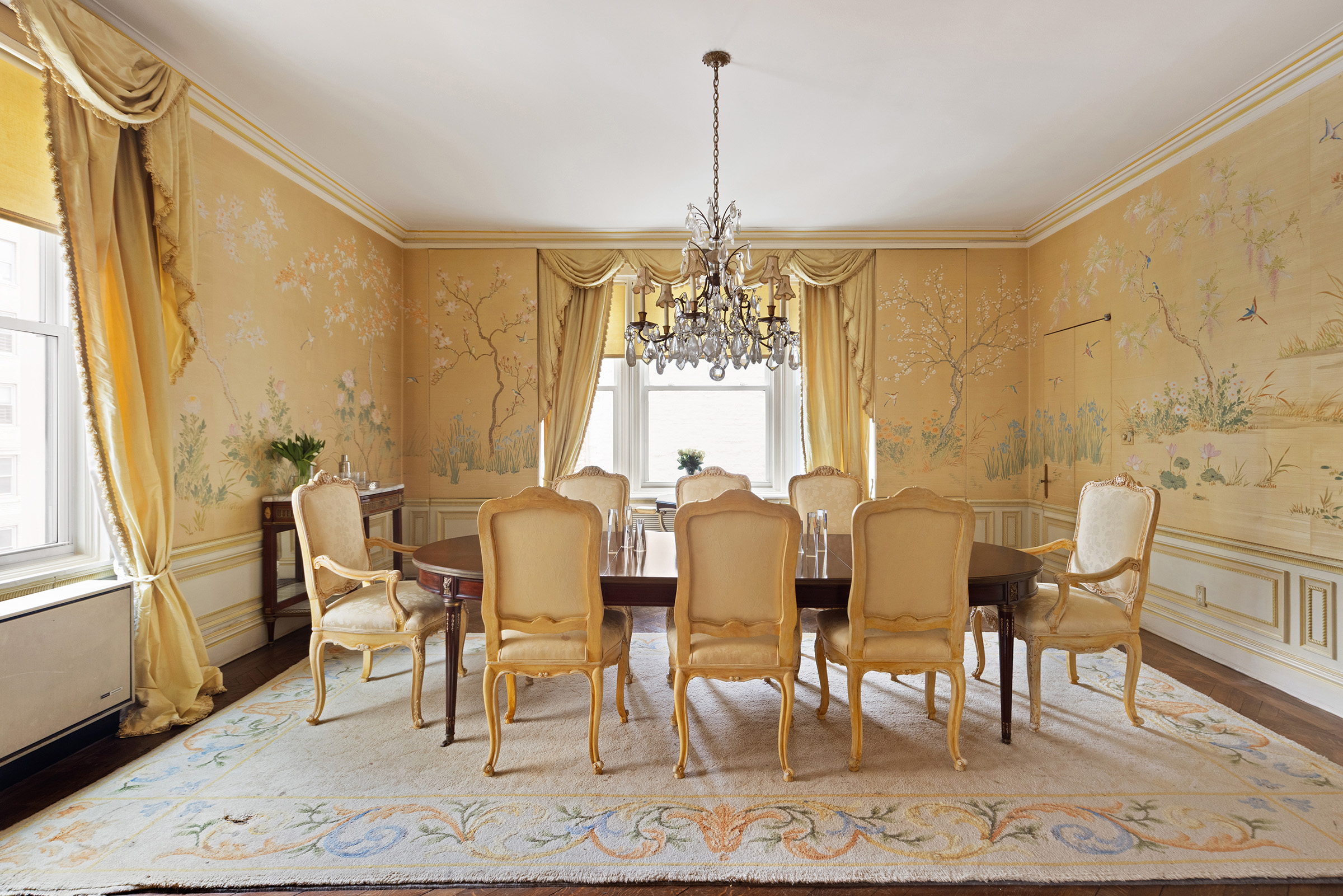 31 East 72nd Street, Unit 4B Manhattan, NY 10021 - Photo 4 of 14 a view of a dining room with furniture window and wooden floor