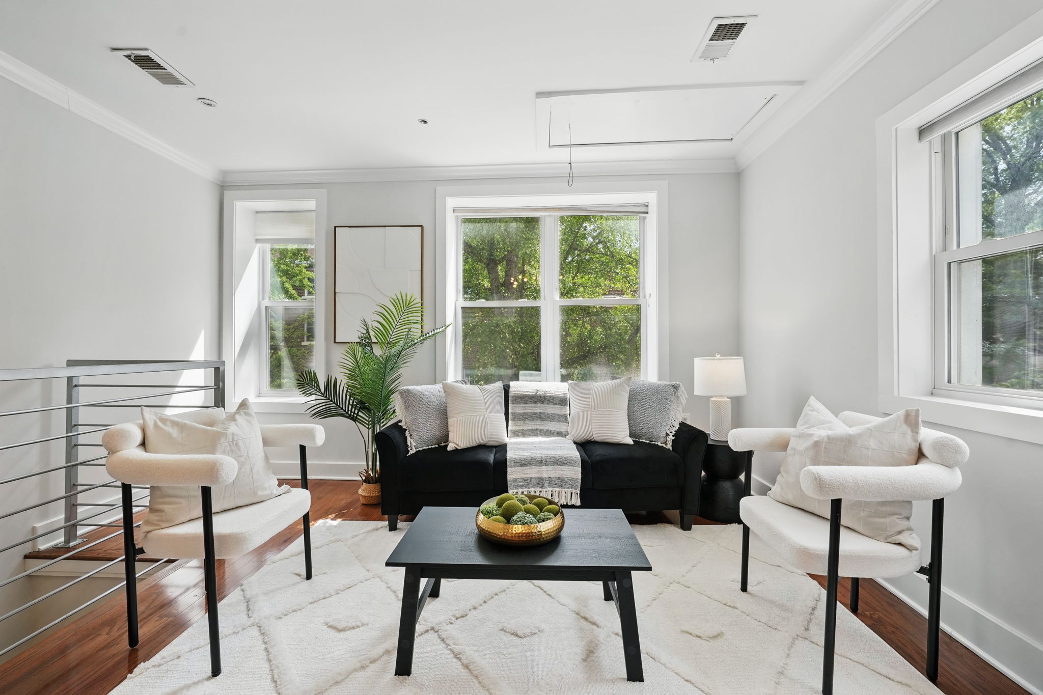 2300 17th Street Northwest Washington, DC 20009 - Photo 1 of 20 a living room with furniture and a large window