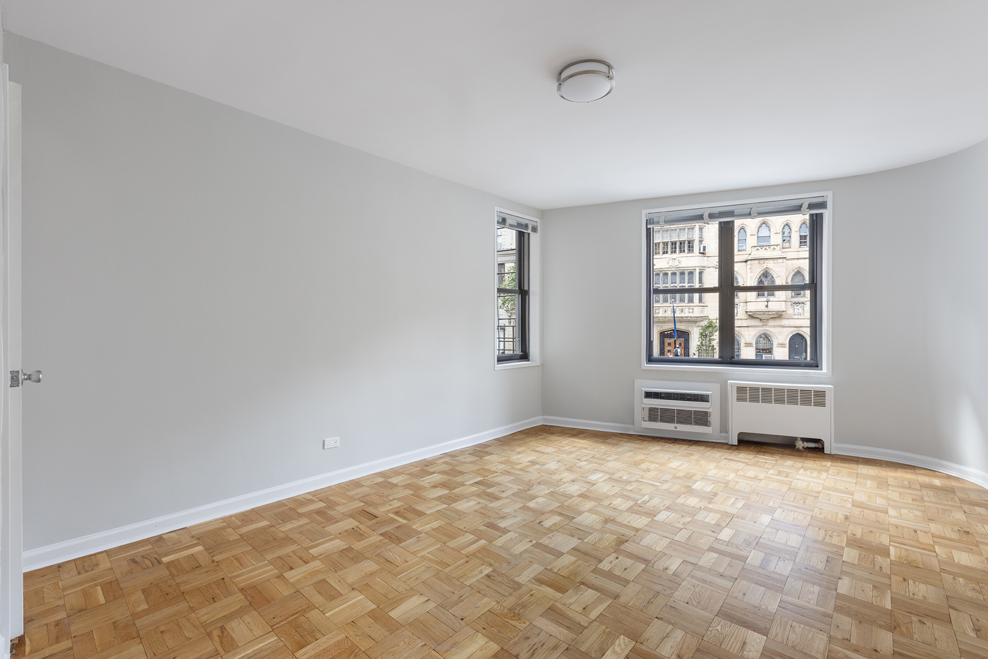 85 4th Avenue, Unit 3FF Manhattan, NY 10003 - Photo 4 of 9 an empty room with windows