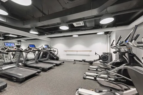 a view of a room with gym equipment