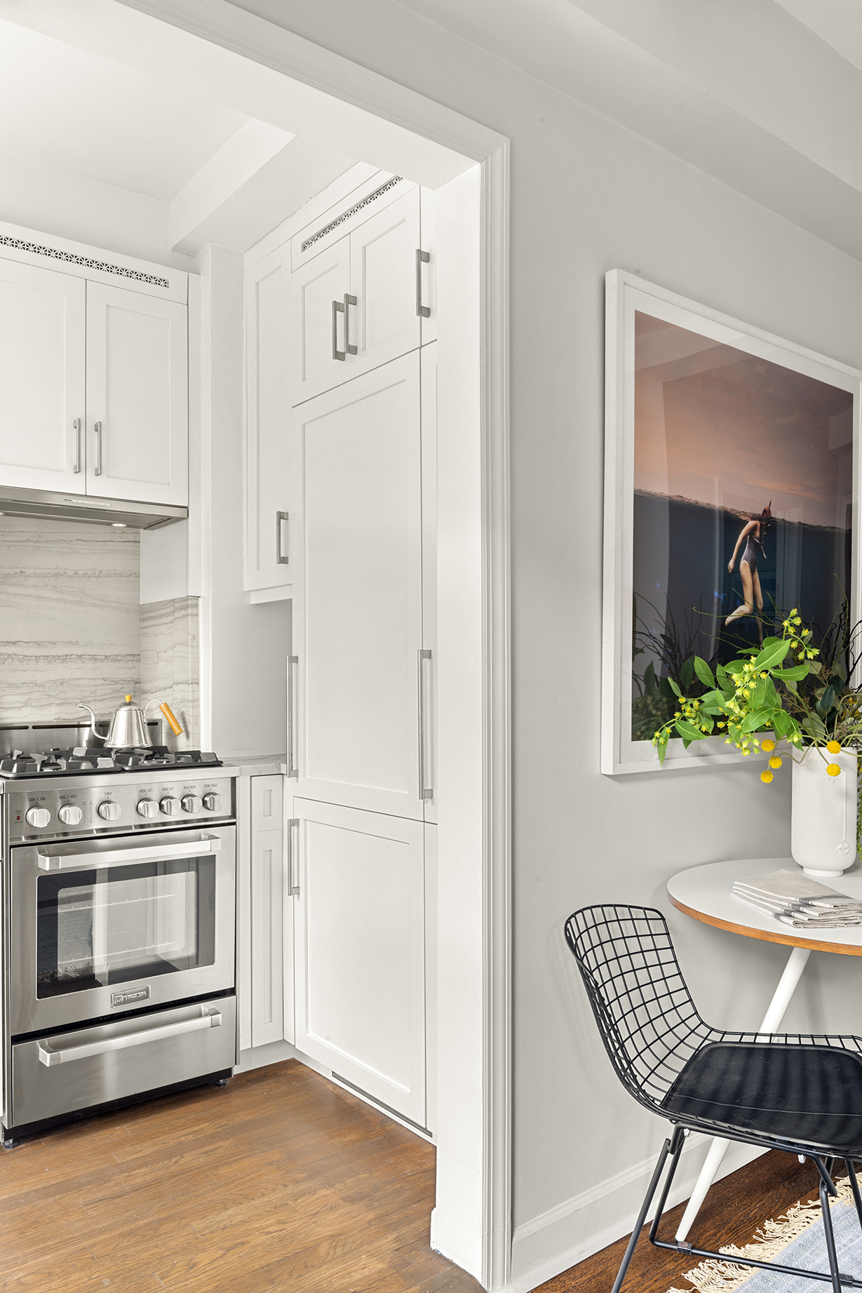 161 West 16th Street, Unit 6E Manhattan, NY 10011 - Photo 4 of 15 a view of a kitchen with a stove