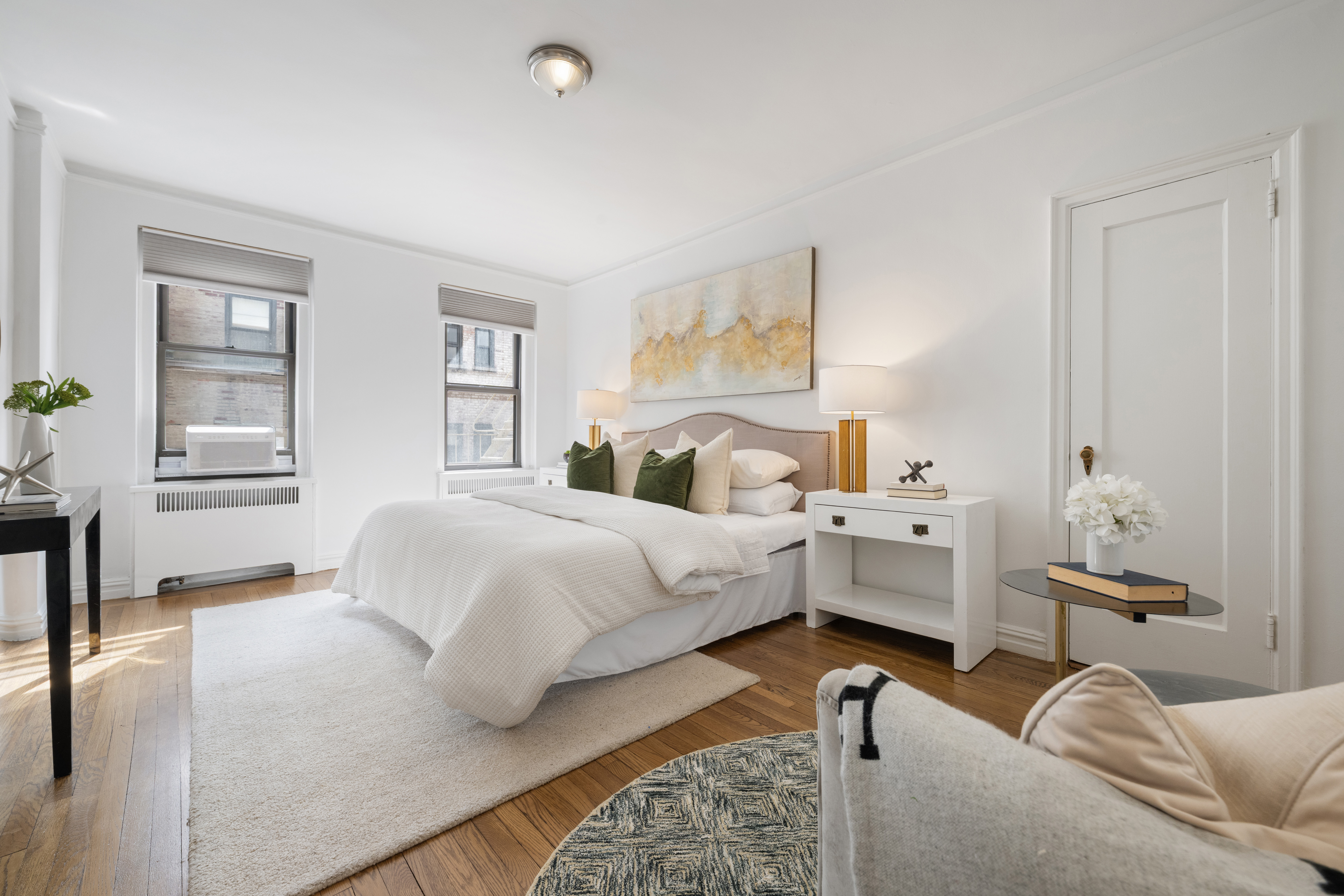 350 Cabrini Boulevard, Unit 7N Manhattan, NY 10040 - Photo 7 of 10 a bedroom with bed and window