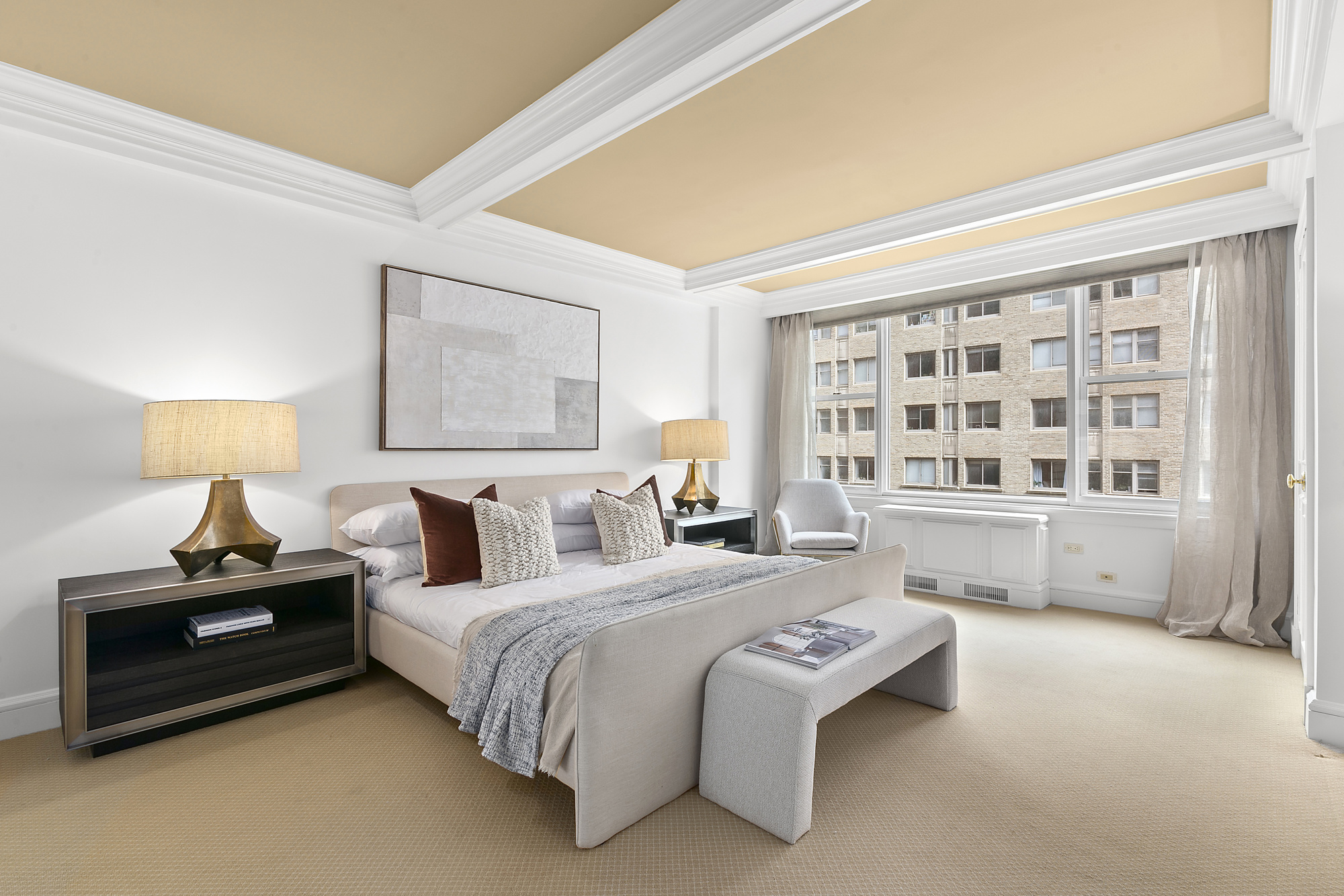 169 East 69th Street, Unit 7/8 B Manhattan, NY 10021 - Photo 14 of 30 a spacious bedroom with a bed and a large window