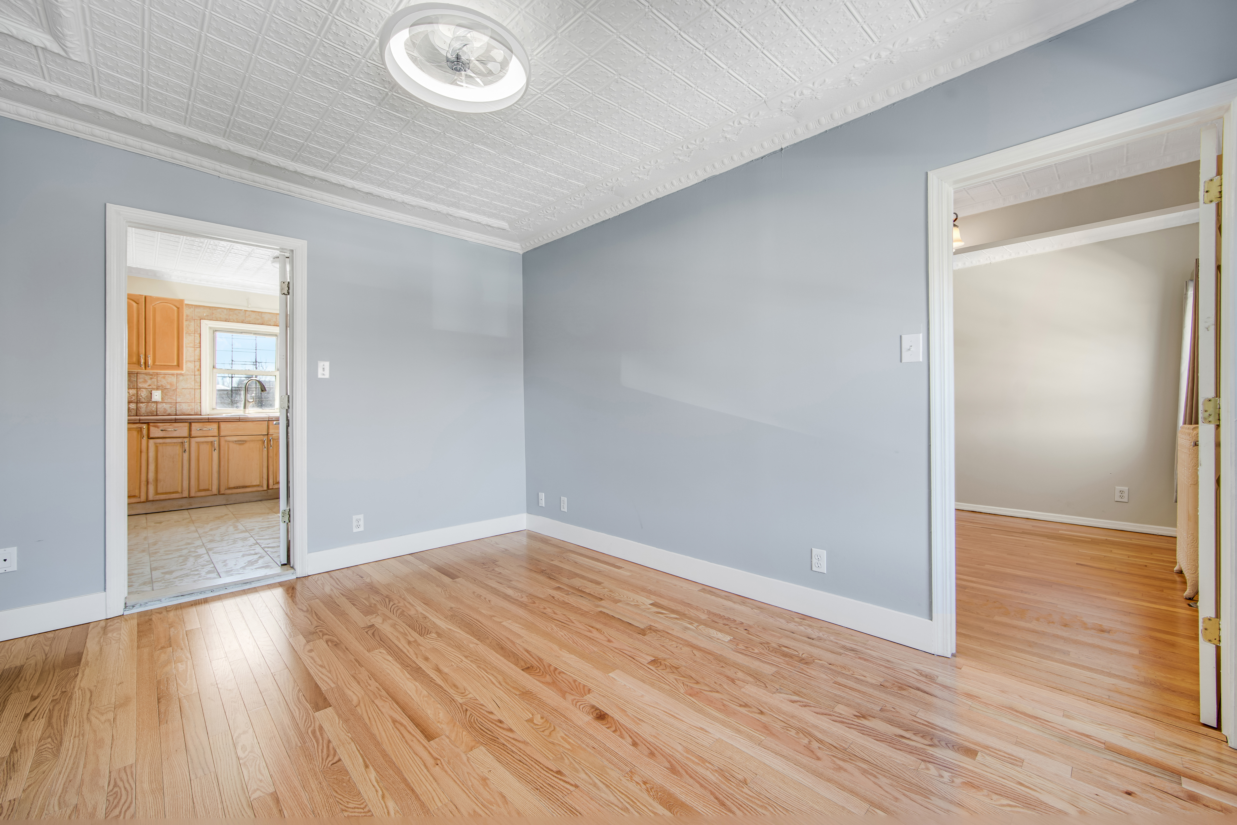 296 17th Street Brooklyn, NY 11215 - Photo 2 of 8 wooden floor in an empty room