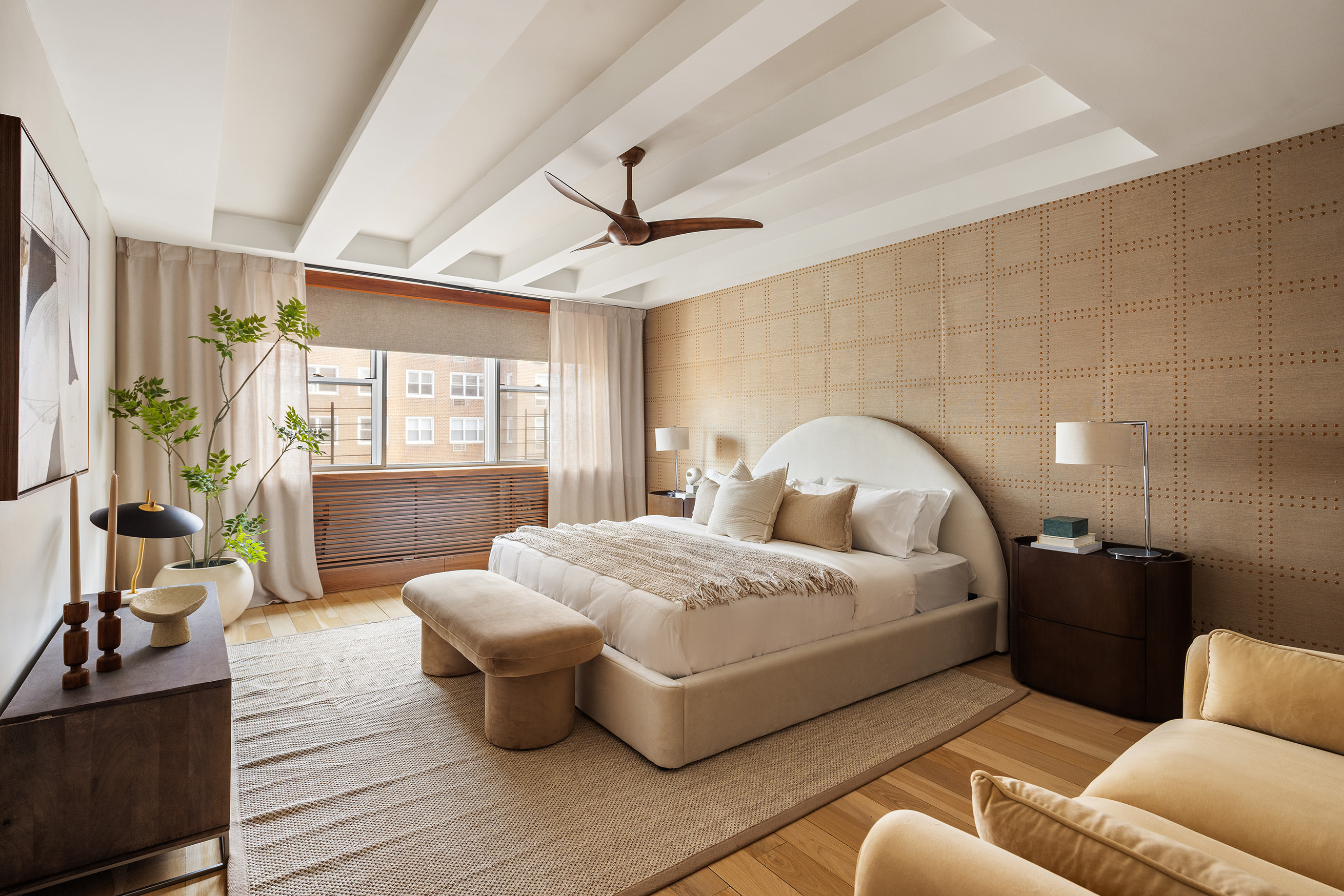 32 Gramercy Park South, Unit 12D Manhattan, NY 10003 - Photo 3 of 14 a bedroom with a large bed and a couch