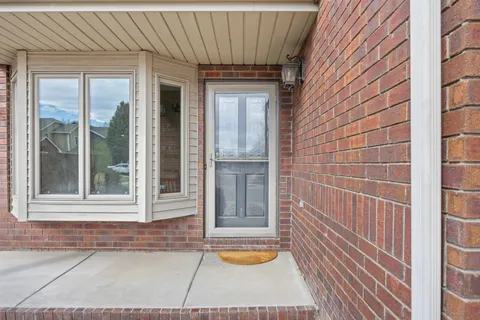 a view of a door and a window