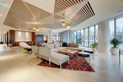 a living room with granite countertop furniture and a couch