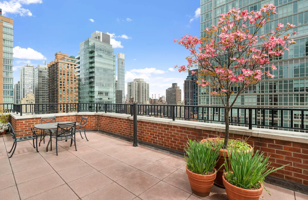 251 East 51st Street, Unit 5A Manhattan, NY 10022 - Photo 20 of 23 a view of a terrace with furniture