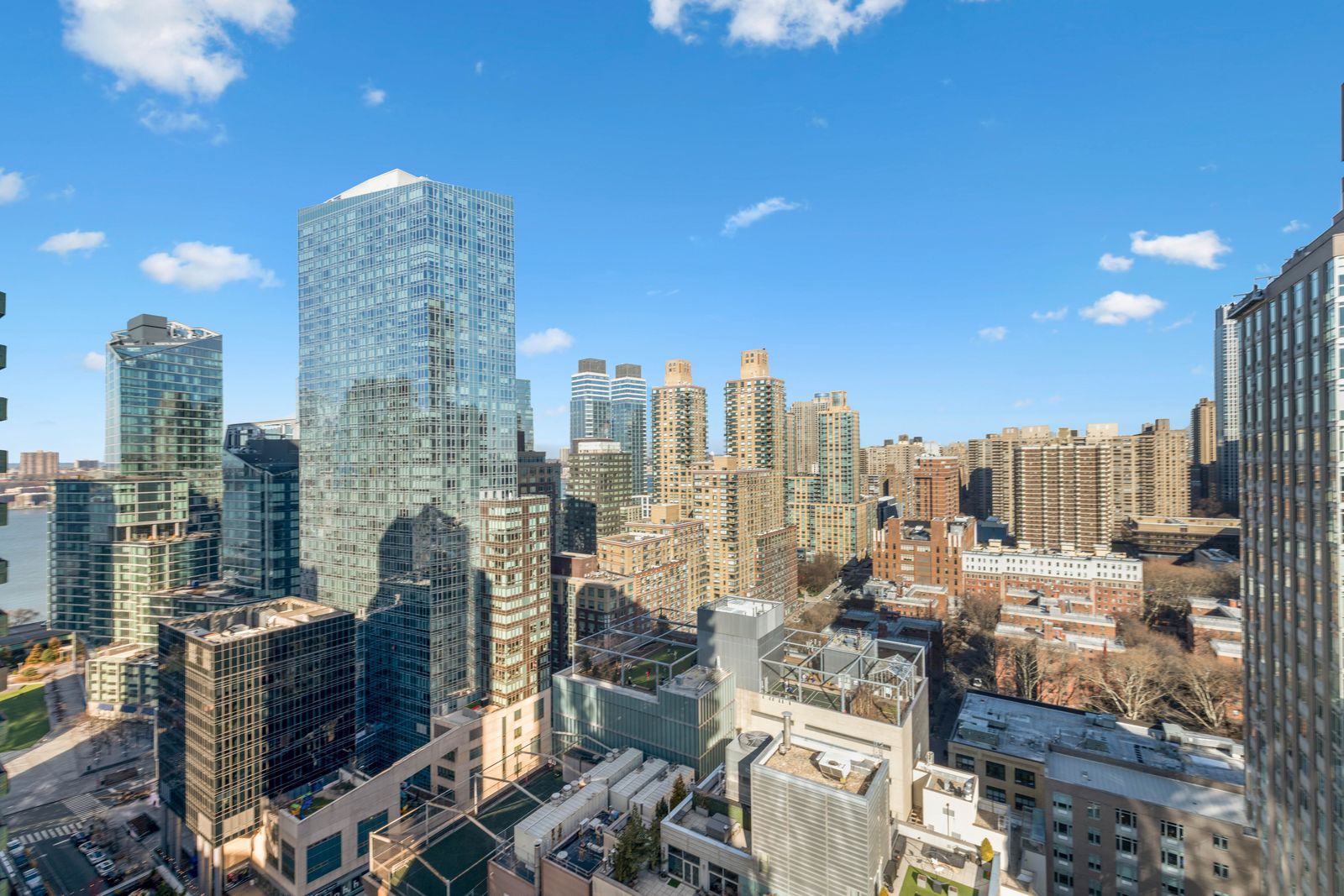 555 West 59th Street, Unit 25E Manhattan, NY 10019 - Photo 12 of 18 a city view with tall buildings