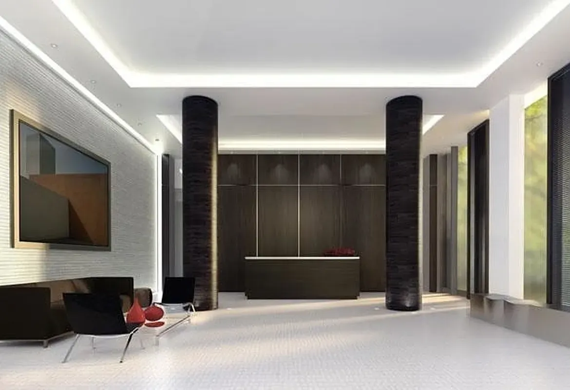 a living room with balcony furniture and a flat screen tv