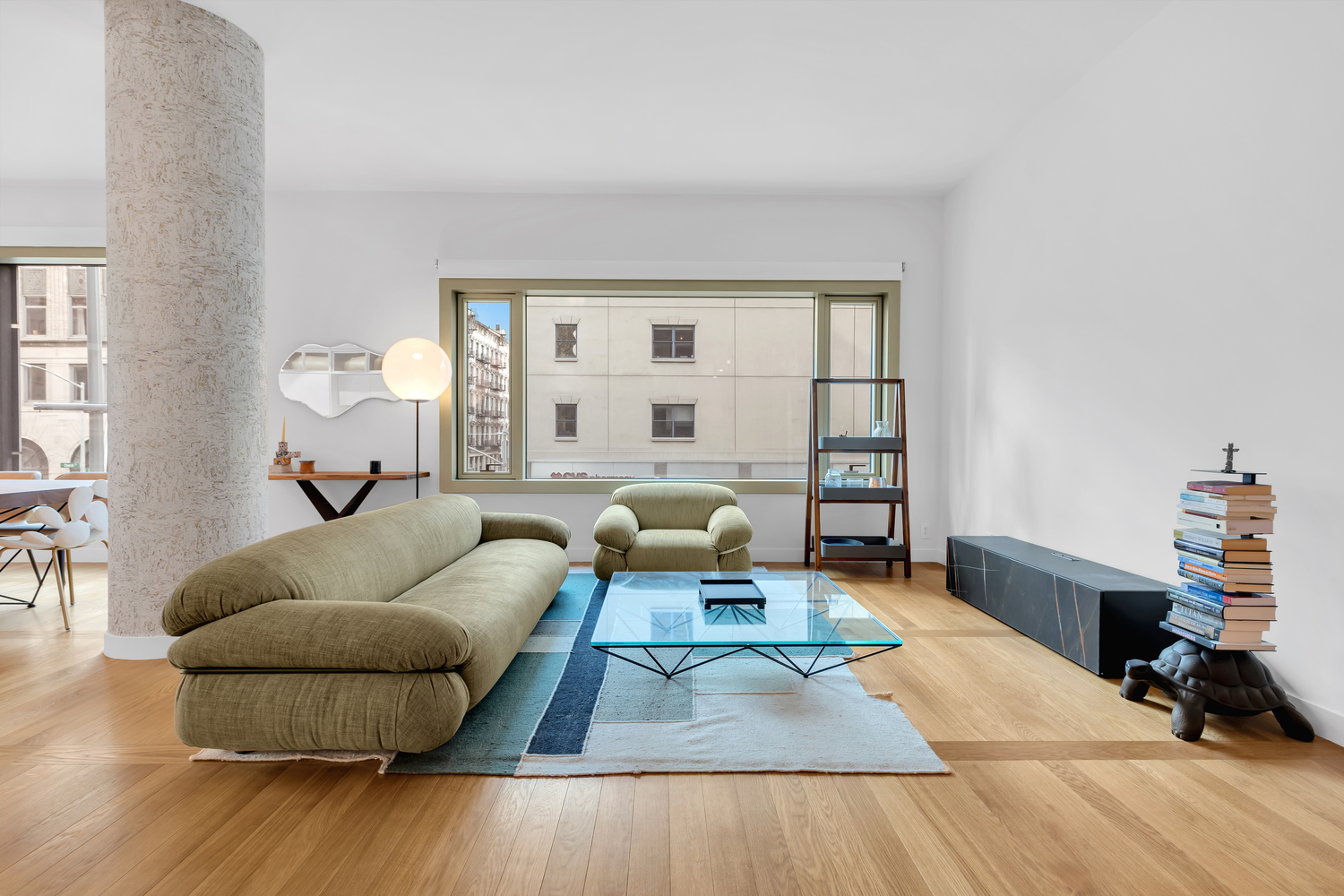 30 Warren Street, Unit 2C Manhattan, NY 10007 - Photo 2 of 18 a living room with furniture and a wooden floor