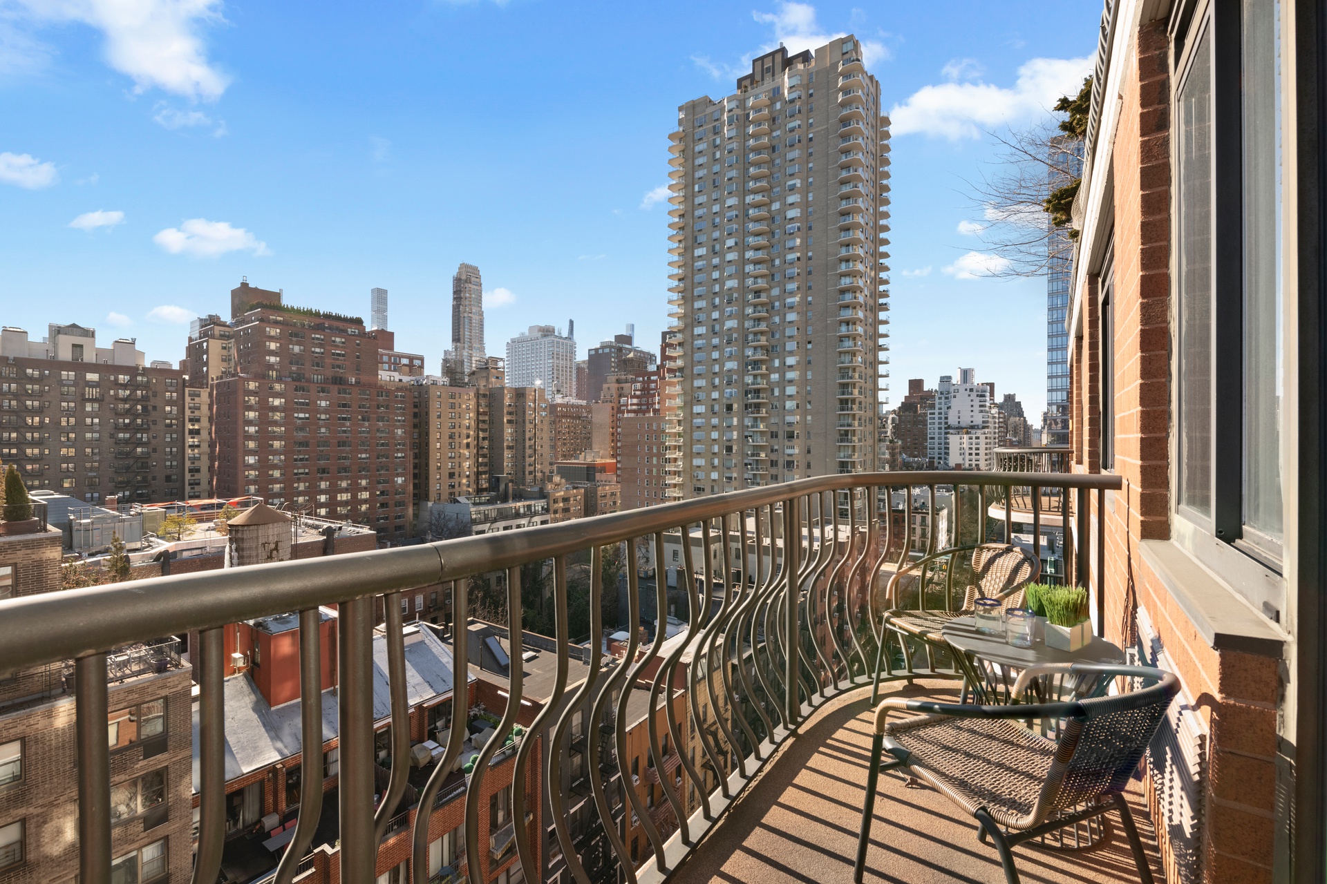 343 East 74th Street, Unit 14K Manhattan, NY 10021 - Photo 3 of 7 a view of a balcony with city view