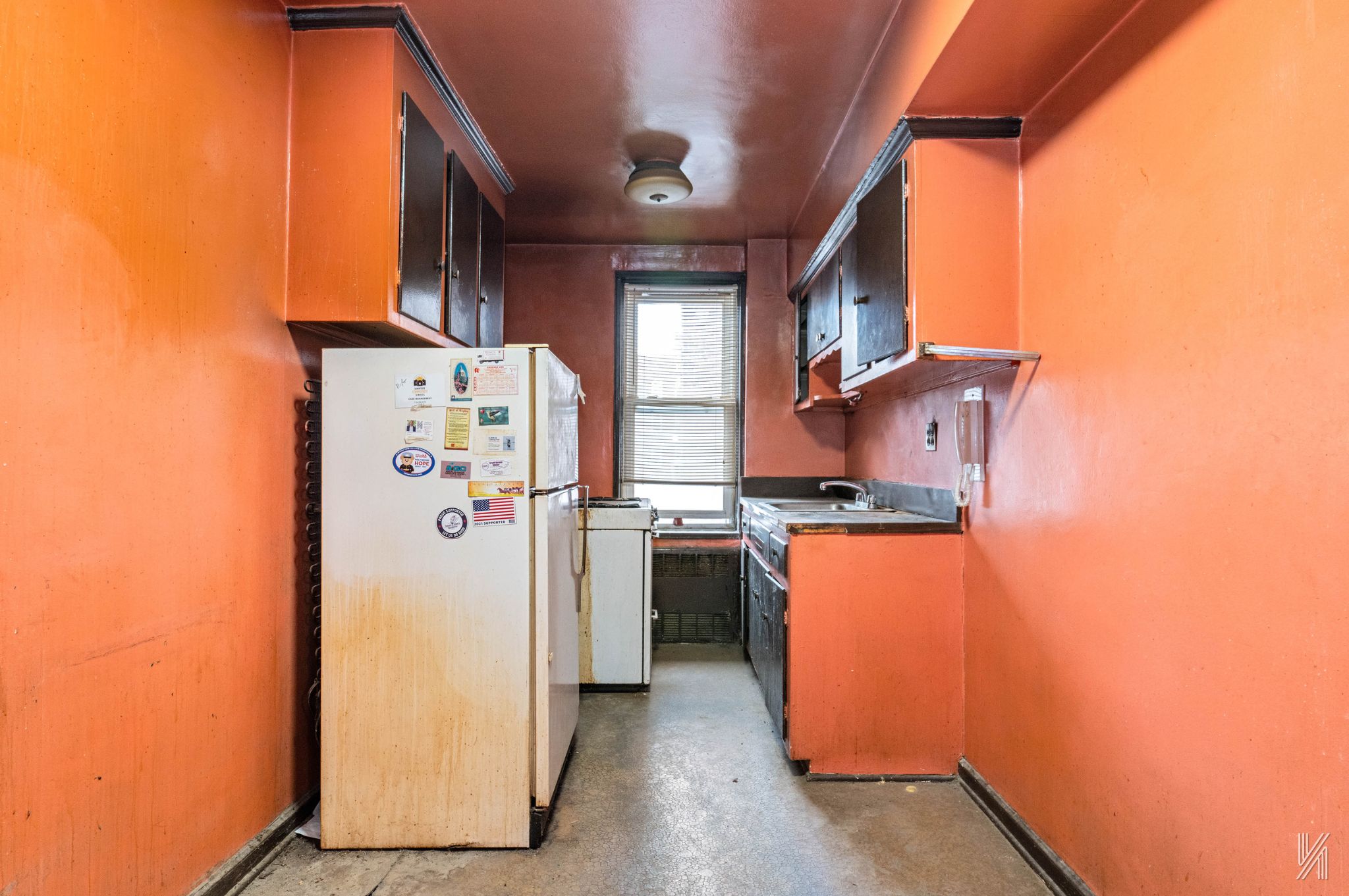 33-05 90th Street, Unit 4F Queens, NY 11372 - Photo 15 of 18 a kitchen with stainless steel appliances granite countertop a refrigerator and a stove