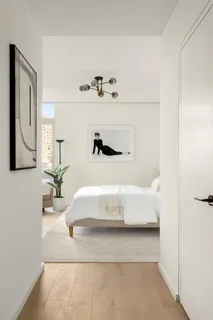 a en suite bathroom with a bathtub and mirror