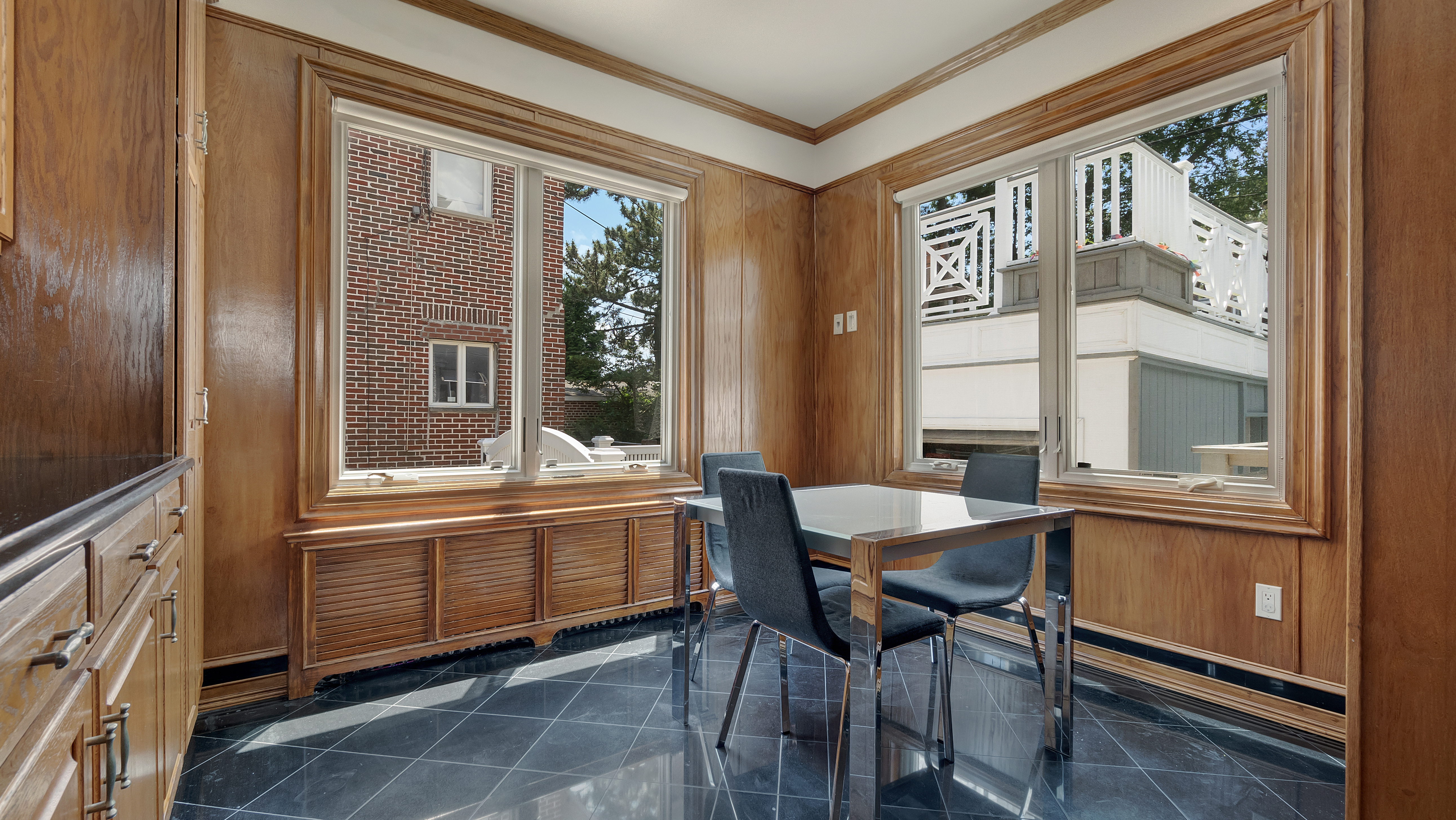 278 Amherst Street Brooklyn, NY 11235 - Photo 8 of 24 a dining room with a window and chairs