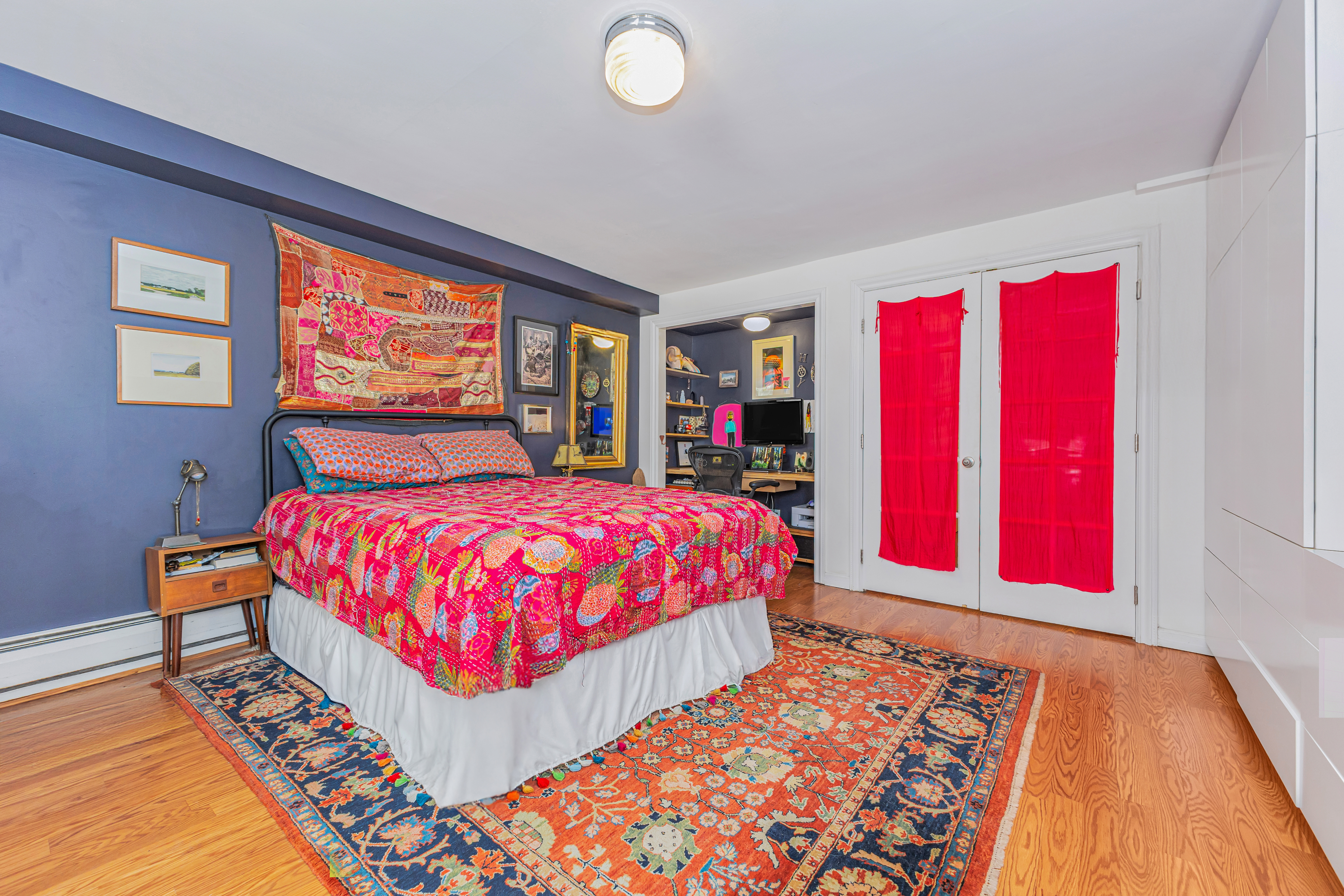 503 Clinton Street, Unit 1 Brooklyn, NY 11231 - Photo 7 of 16 a bedroom with a bed and wooden floor