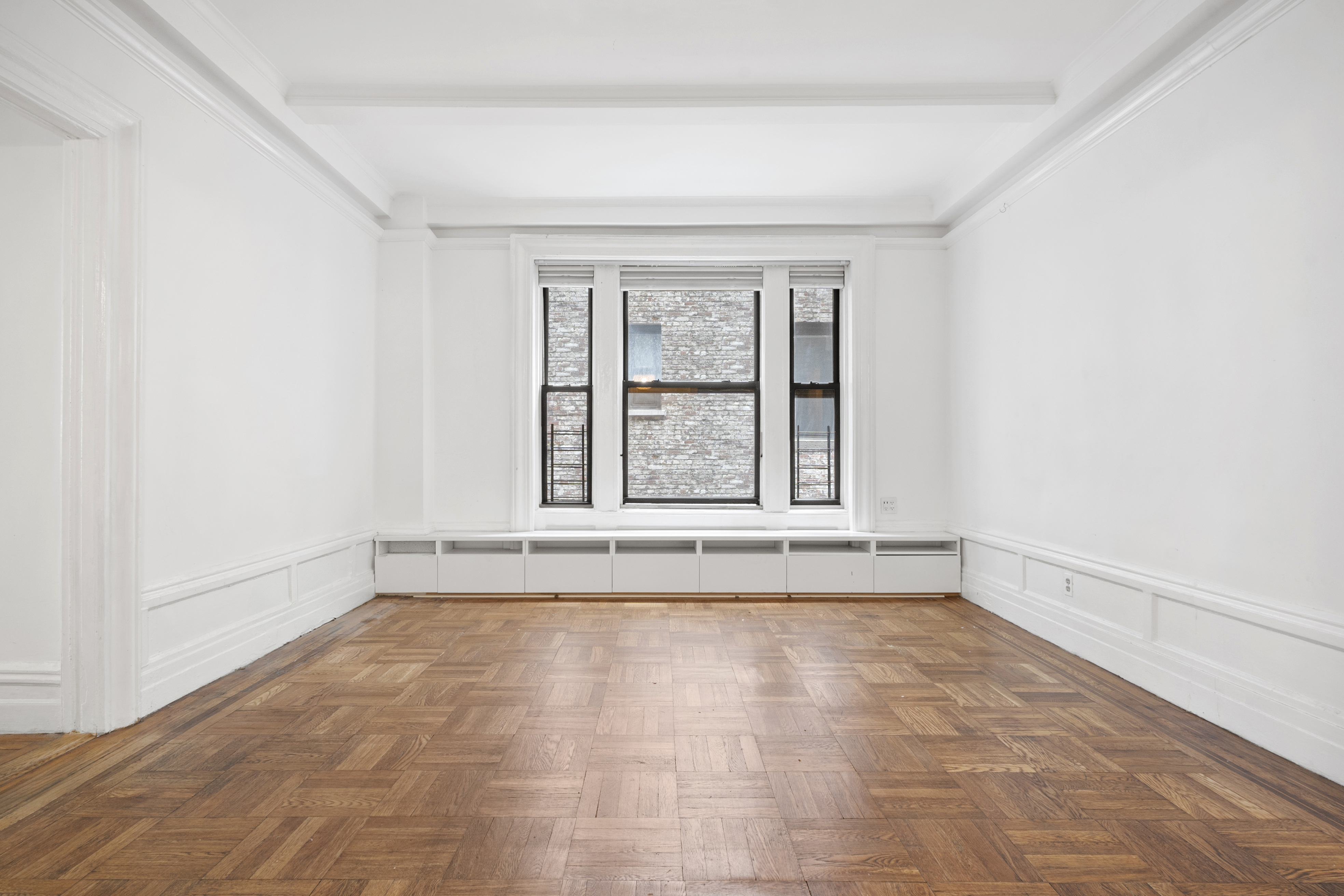 146 East 49th Street, Unit 6CD Manhattan, NY 10017 - Photo 9 of 12 a view of an empty room with a window