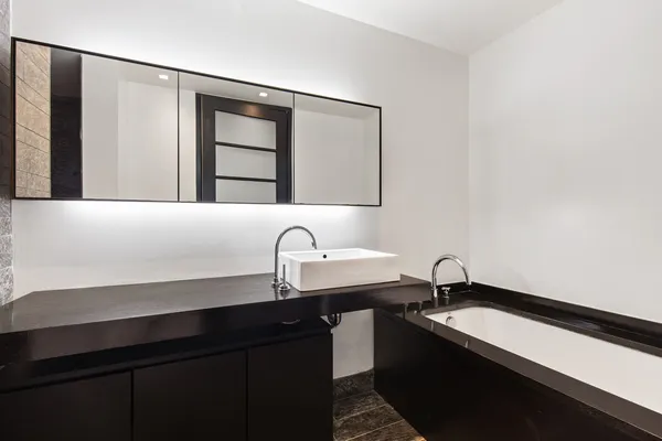 a close view of sink and mirror