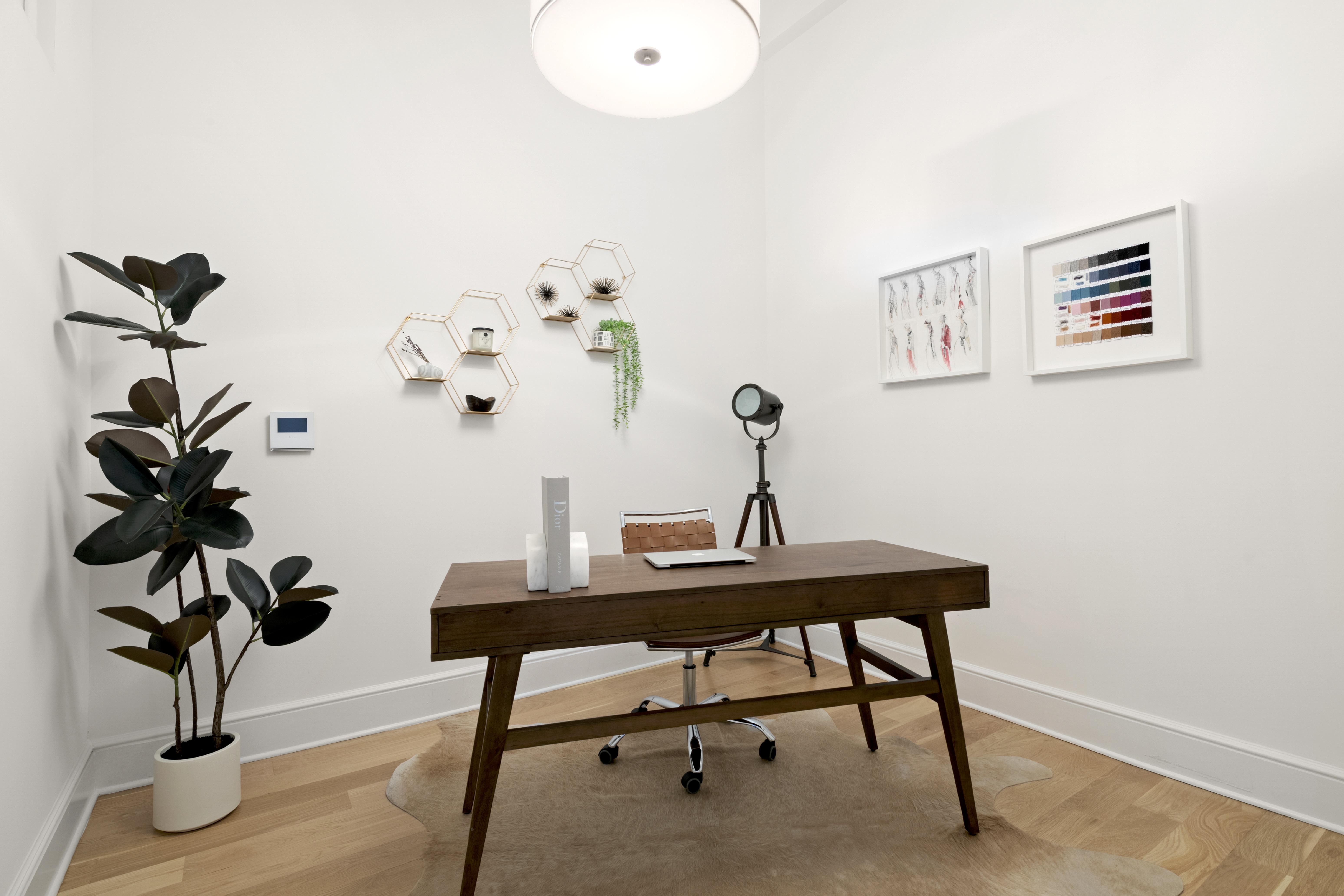55 Berry Street, Unit 4B Brooklyn, NY 11249 - Photo 6 of 12 a view of a workspace with a table and a potted plant