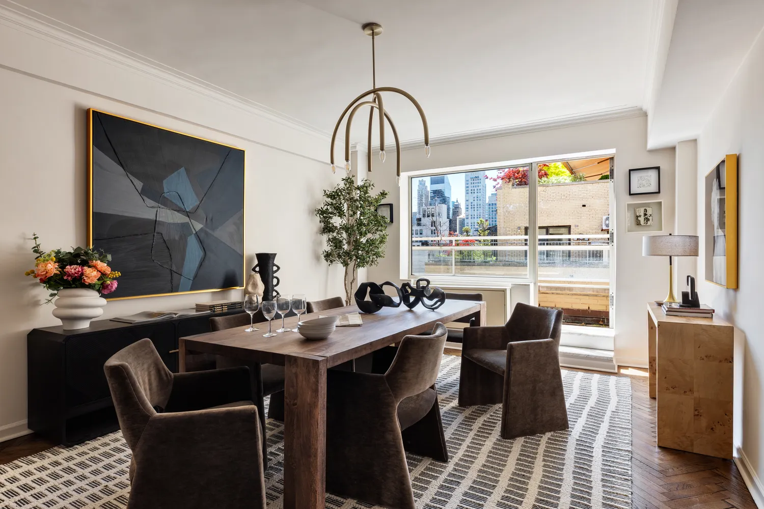 a view of a dining room with furniture window and outside view