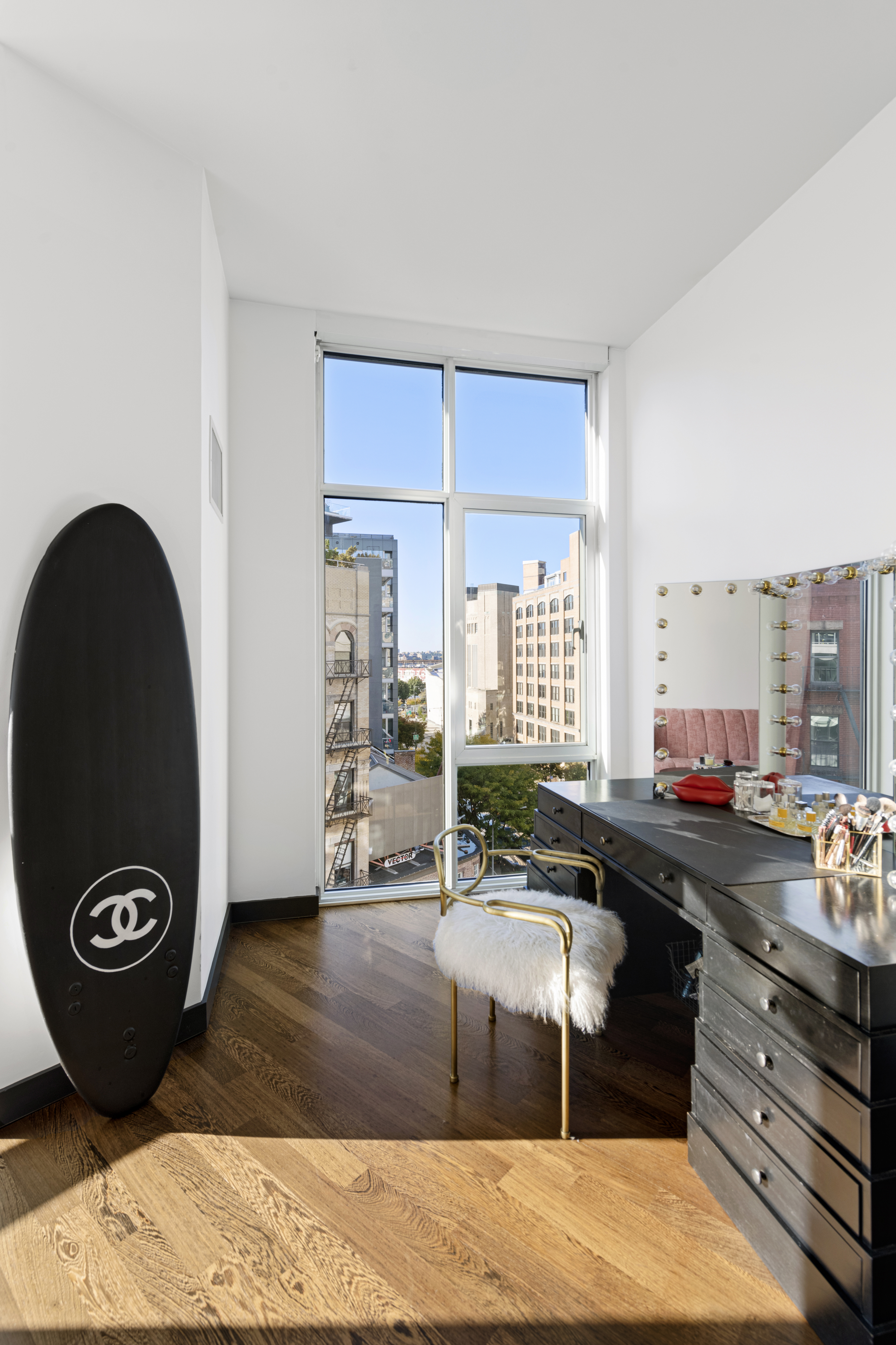 475 Greenwich Street, Unit PHN Manhattan, NY 10013 - Photo 15 of 28 a living room with a couch and a table