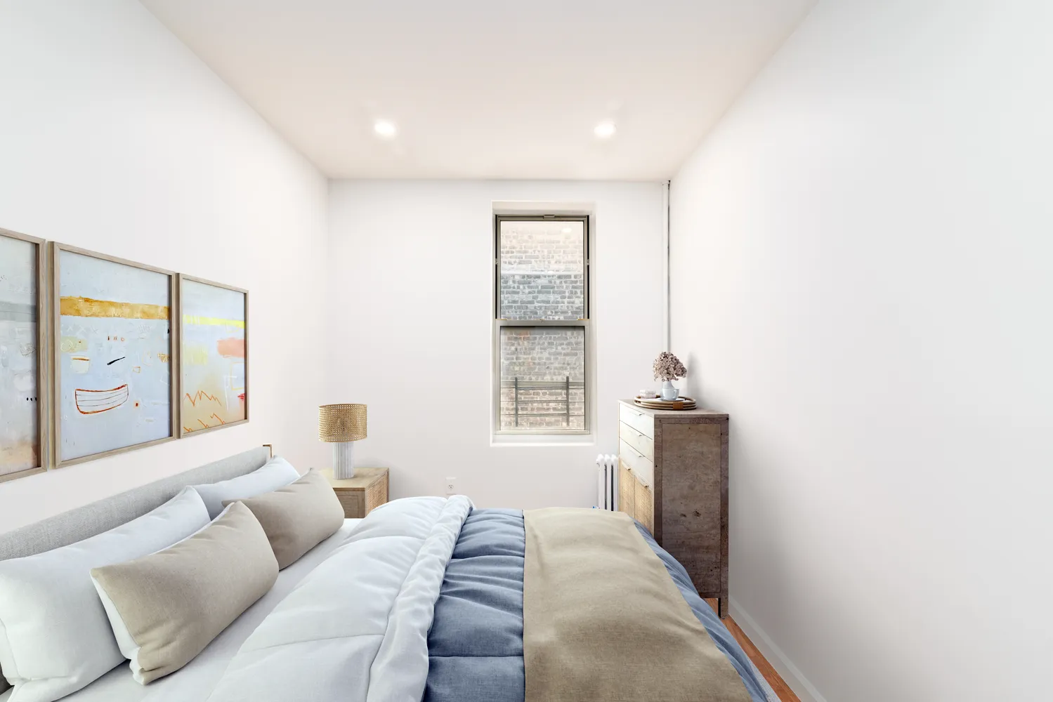 a bed room with a bed and a window