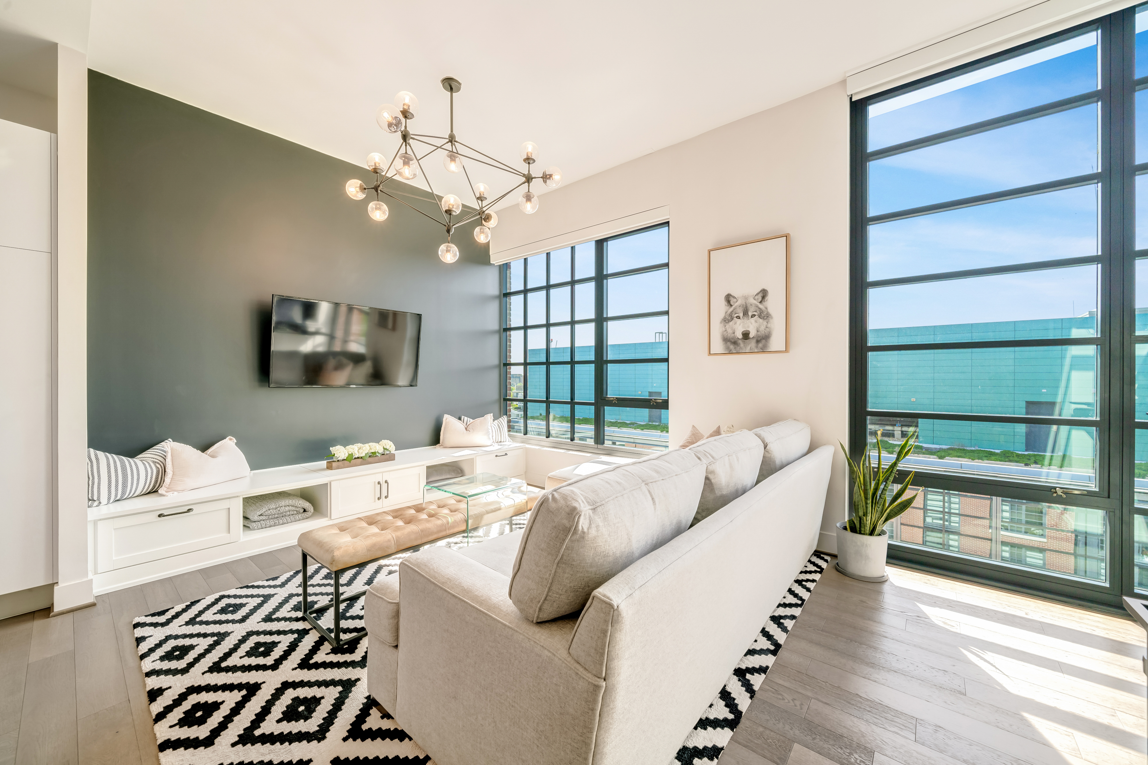 45 Sutton Square Southwest, Unit PH10 Washington, DC 20024 - Photo 8 of 44 a living room with furniture and a large window