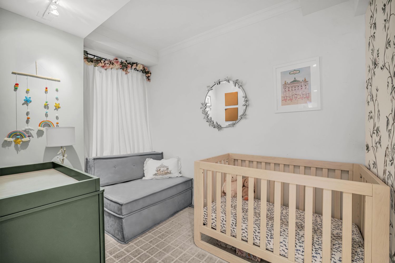 a bedroom with furniture and a window