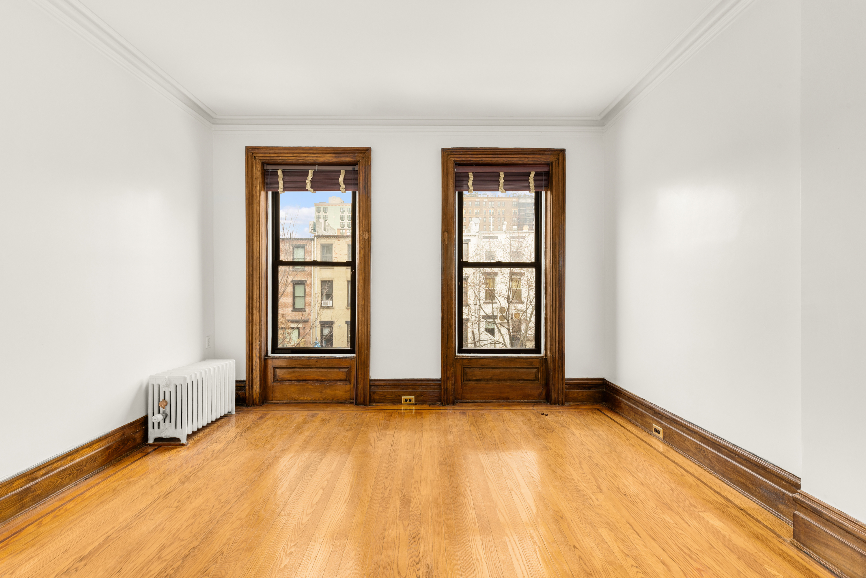 839 Carroll Street, Unit D1 Brooklyn, NY 11215 - Photo 3 of 7 an empty room with windows