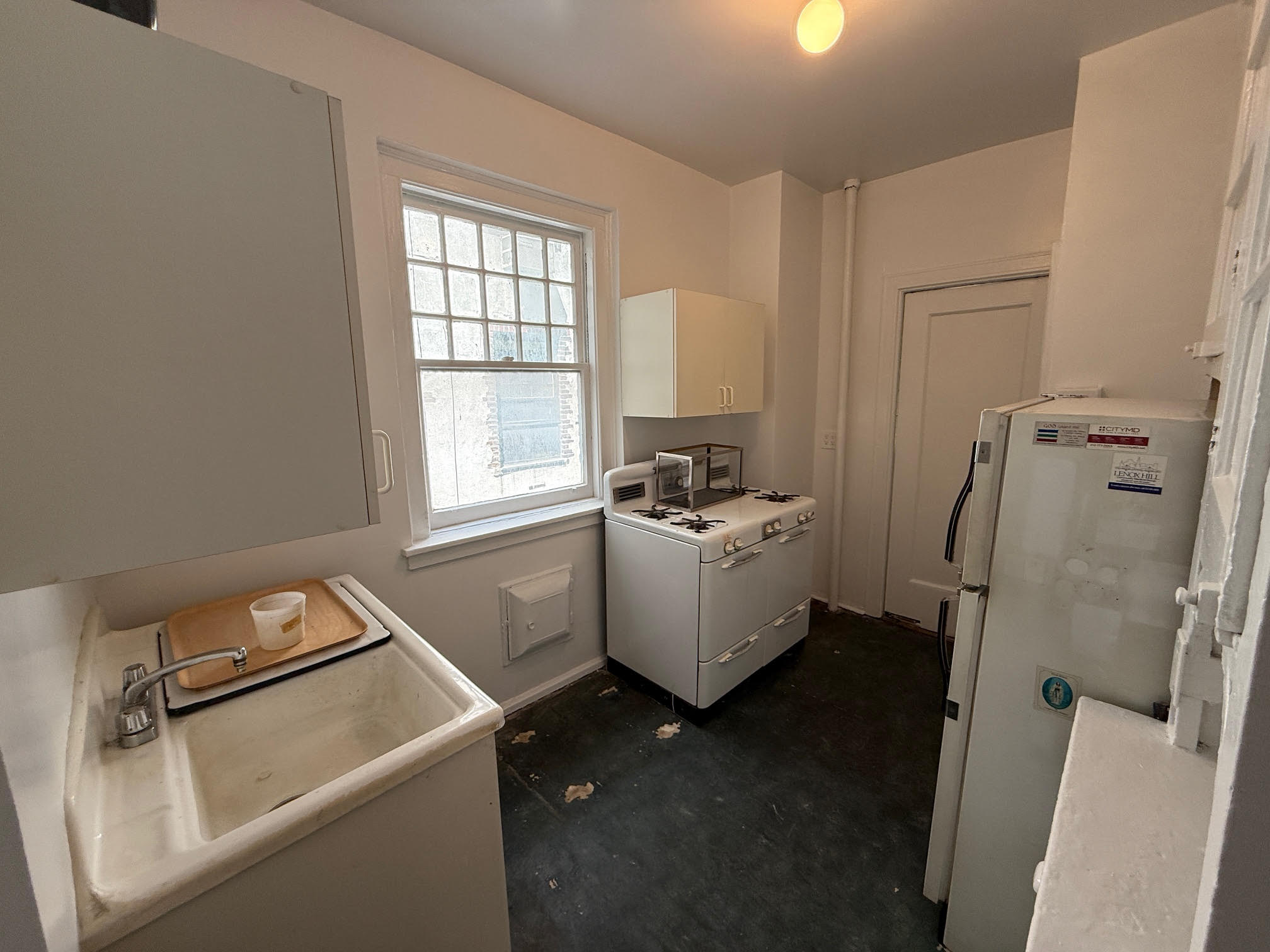 370 Central Park West, Unit 413 Manhattan, NY 10025 - Photo 9 of 19 a room with furniture and a window