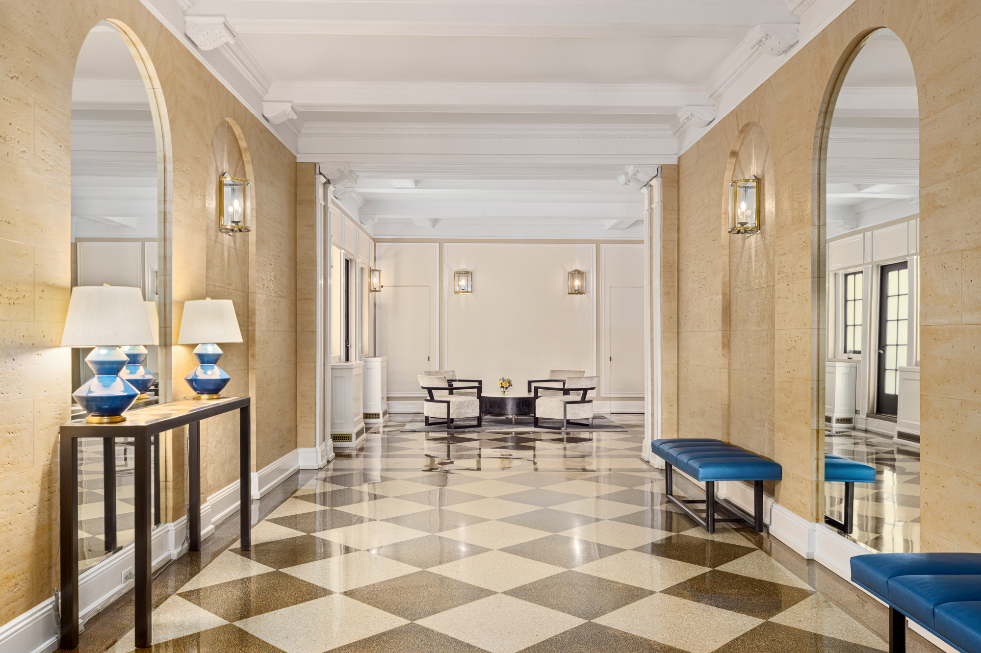 38 East 85th Street, Unit 10E Manhattan, NY 10028 - Photo 10 of 14 a lobby with furniture and rug